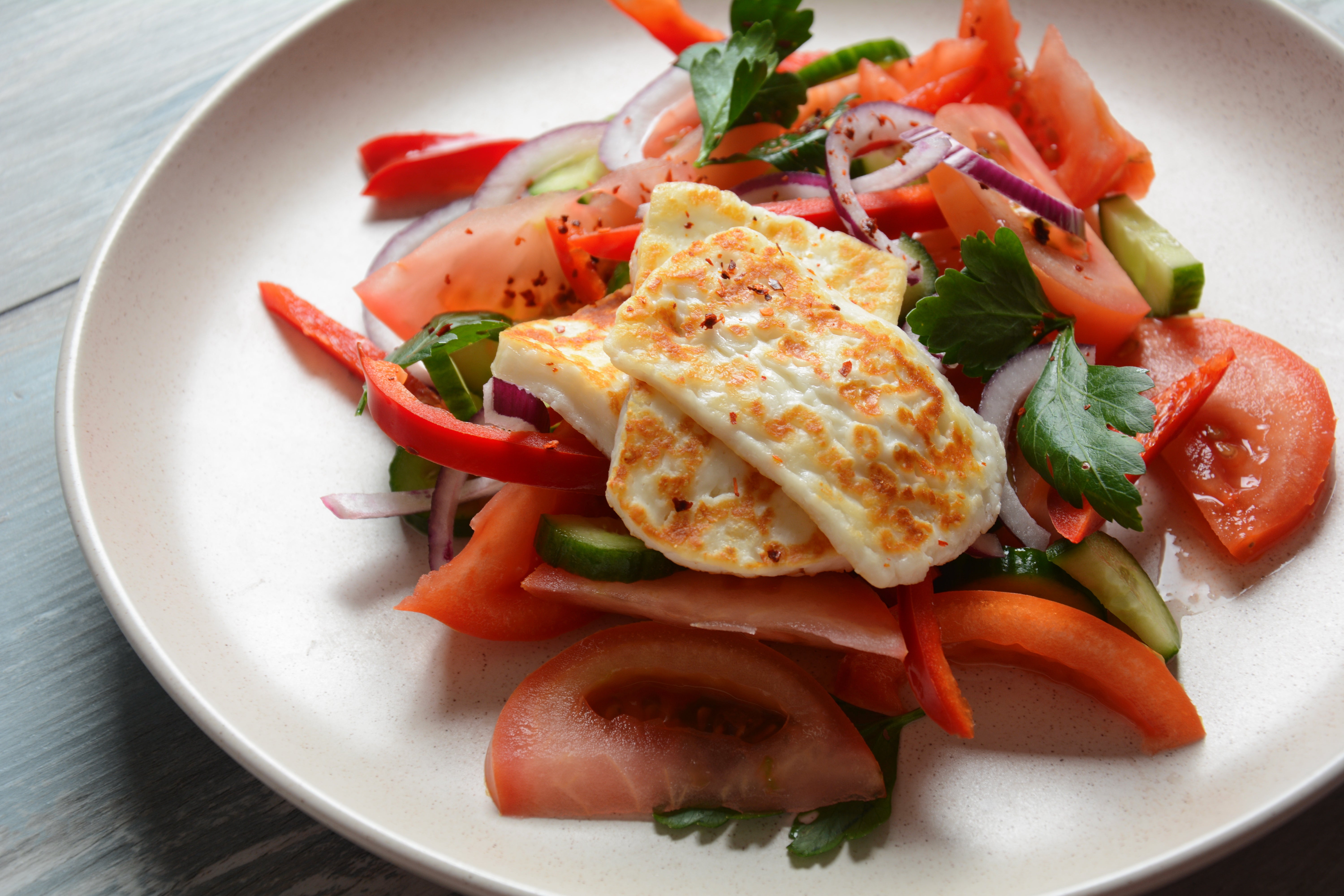 The play between salty, hot cheese and sweet, juicy tomatoes is what makes this dish sizzle