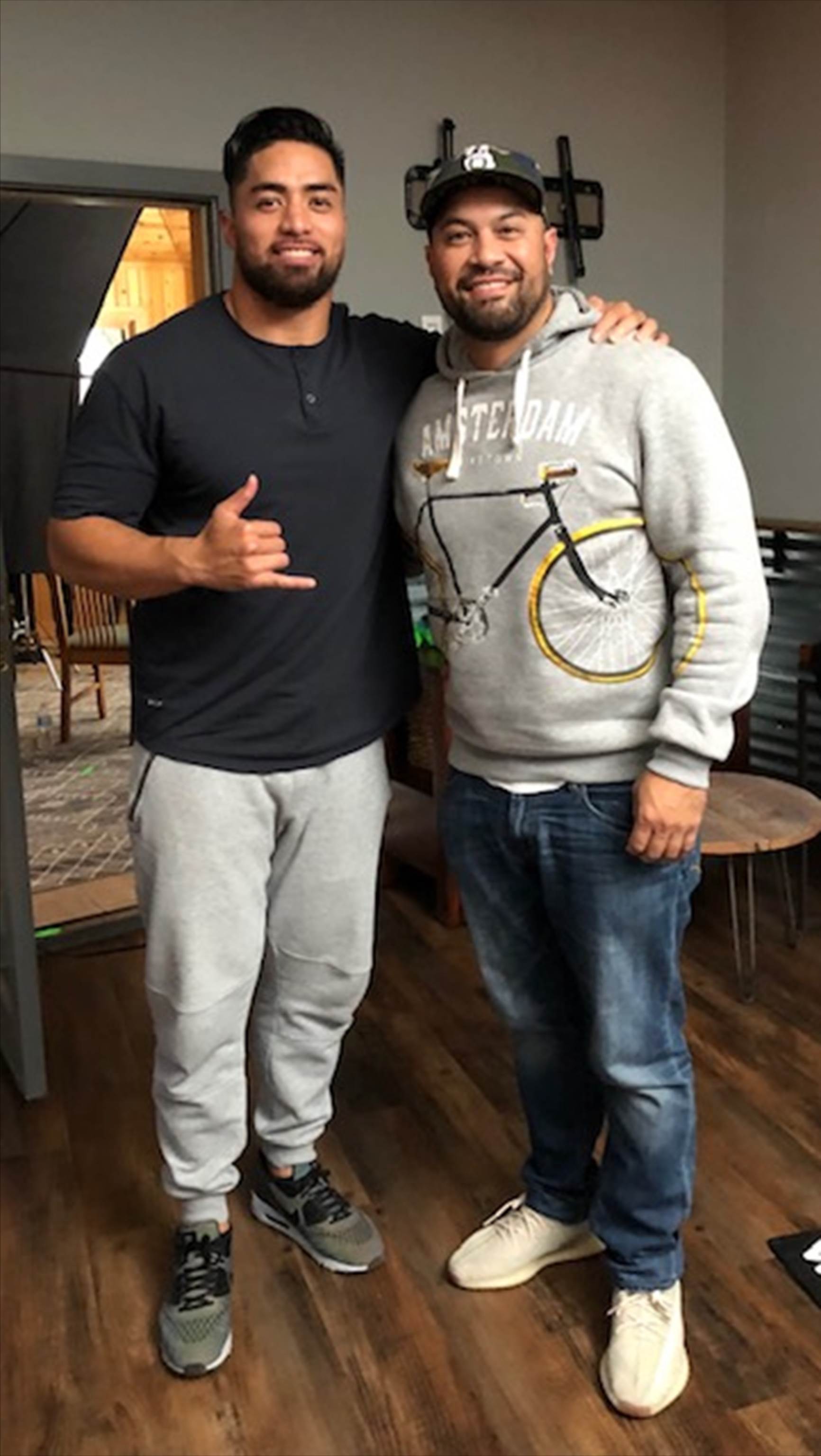 Te’o, right, poses with the co-director of Untold, Tony Vainuku