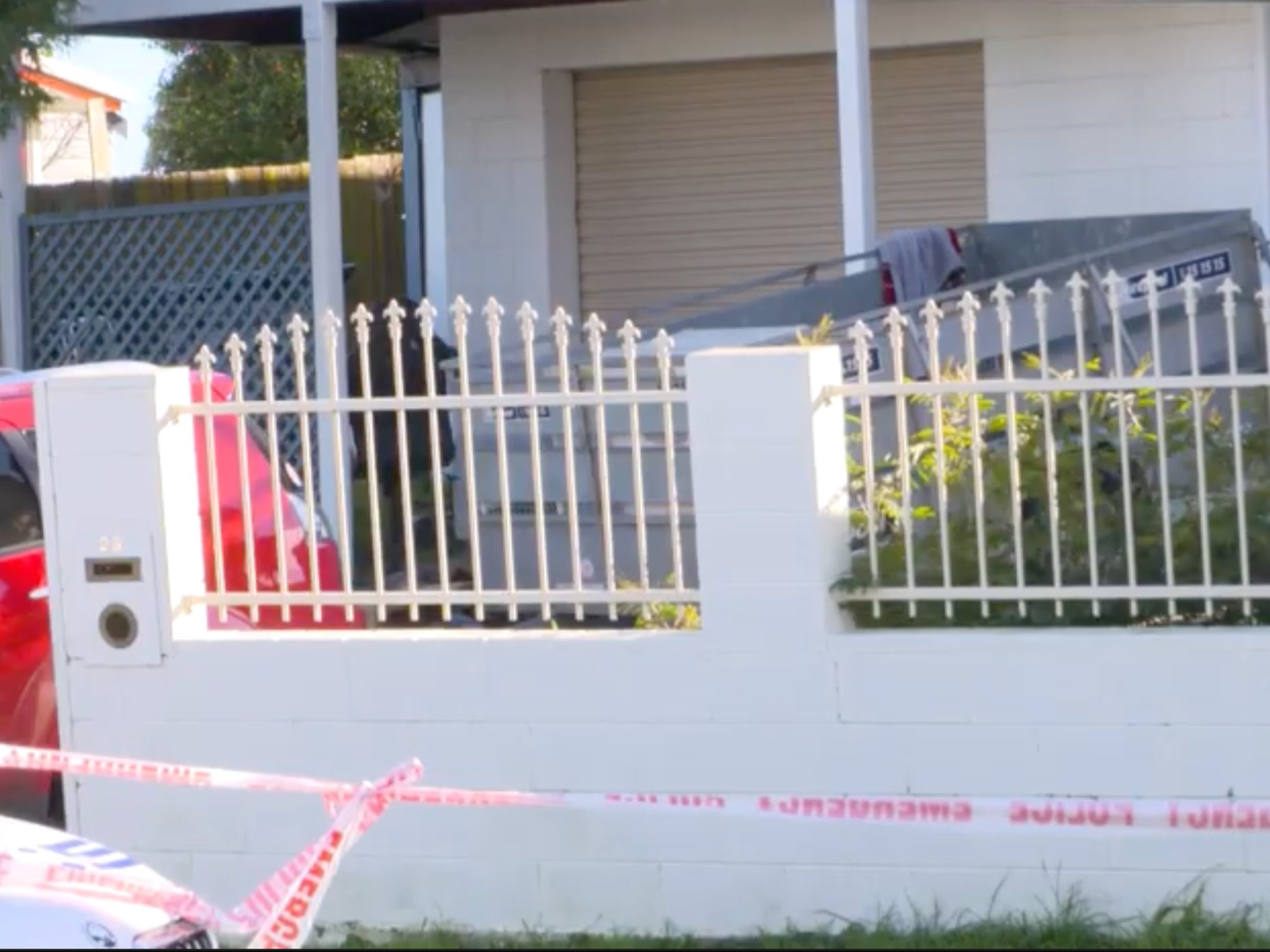 The storage unit outside the house cordoned off by police