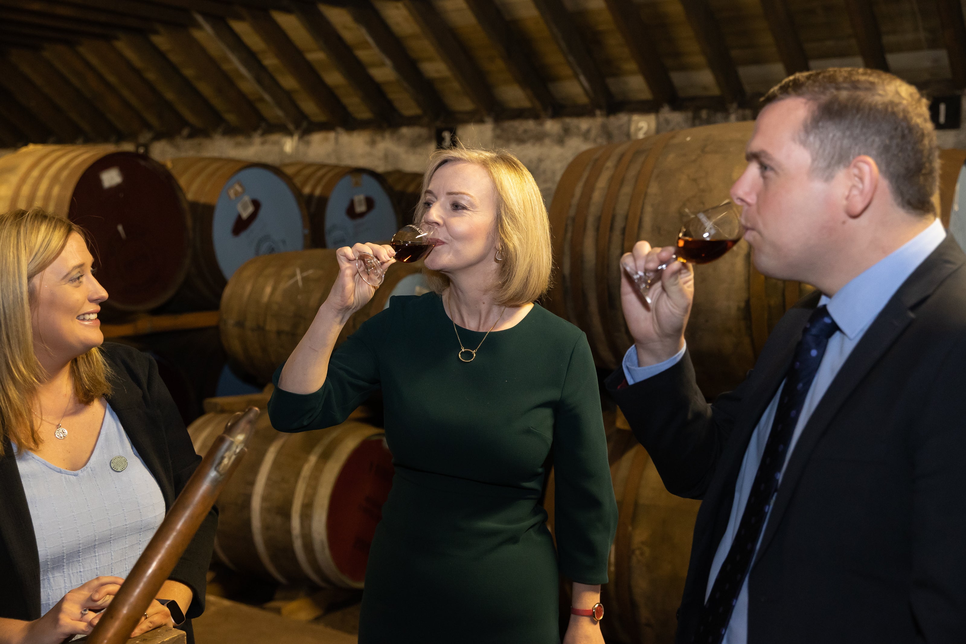 Distilleries production manager Laura Tolmie, Liz Truss and Scottish Conservative Leader Douglas Ross during a campaign visit to the BenRiach Distillery in Speyside, as part of her campaign to be leader of the Conservative Party and the next prime minister (Paul Campbell/PA)