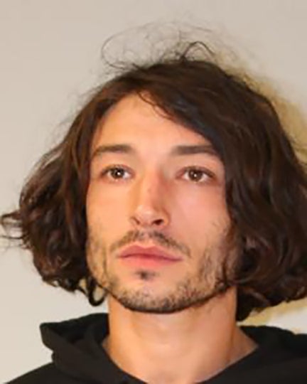 Miller’s booking photo following their April arrest for second-degree assault in Hawaii