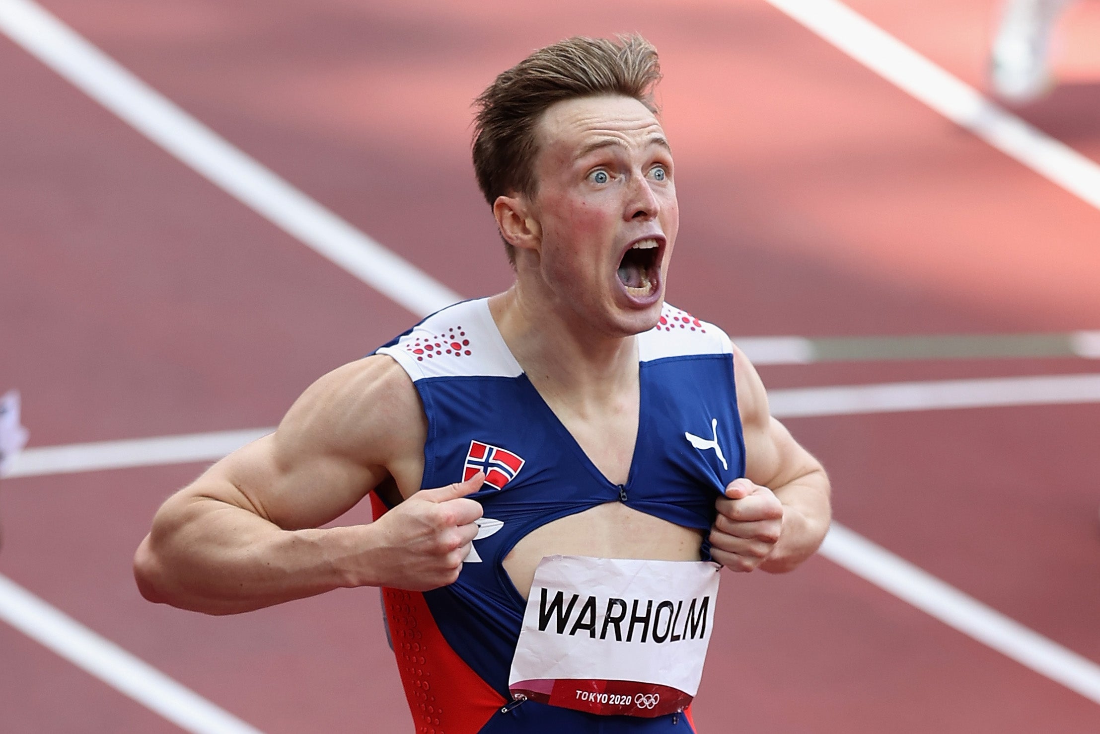 Warholm reacts after winning the Olympic gold medal in Tokyo