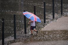 UK weather – live: New hosepipe ban to start in days as storm warning upgraded to amber