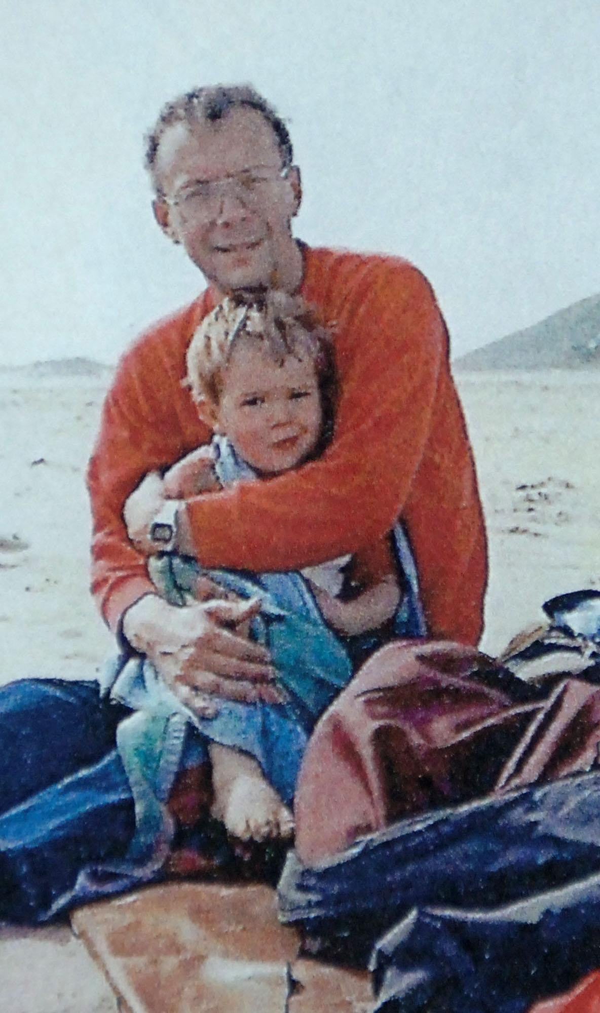 Bob Threakall with his son David in 1985 (PA)