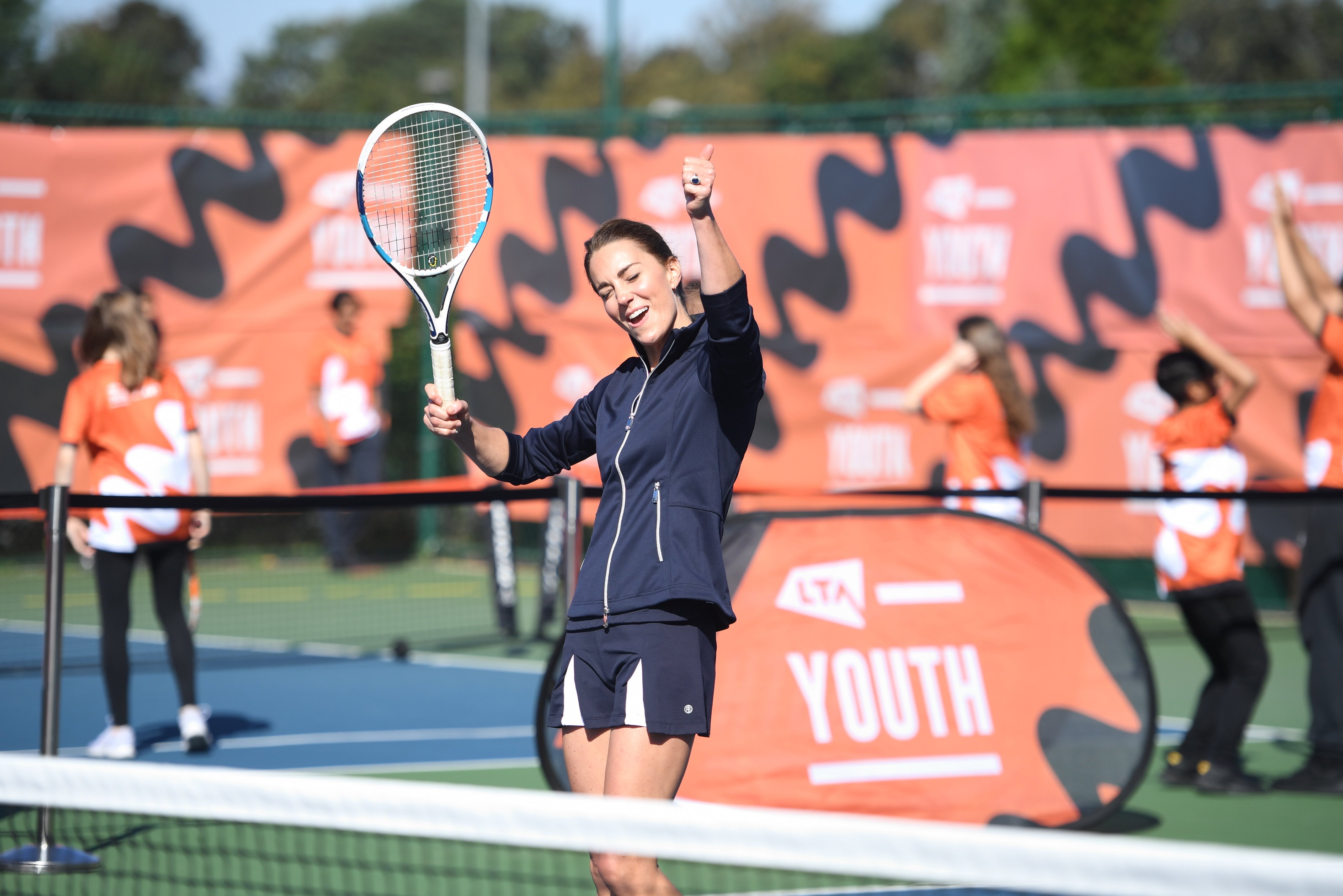 The Duchess of Cambridge reacts as she plays with British US Open champion Emma Raducanu during an event hosted by the LTA Youth programme (Jeremy Selwyn/Evening Standard/PA)