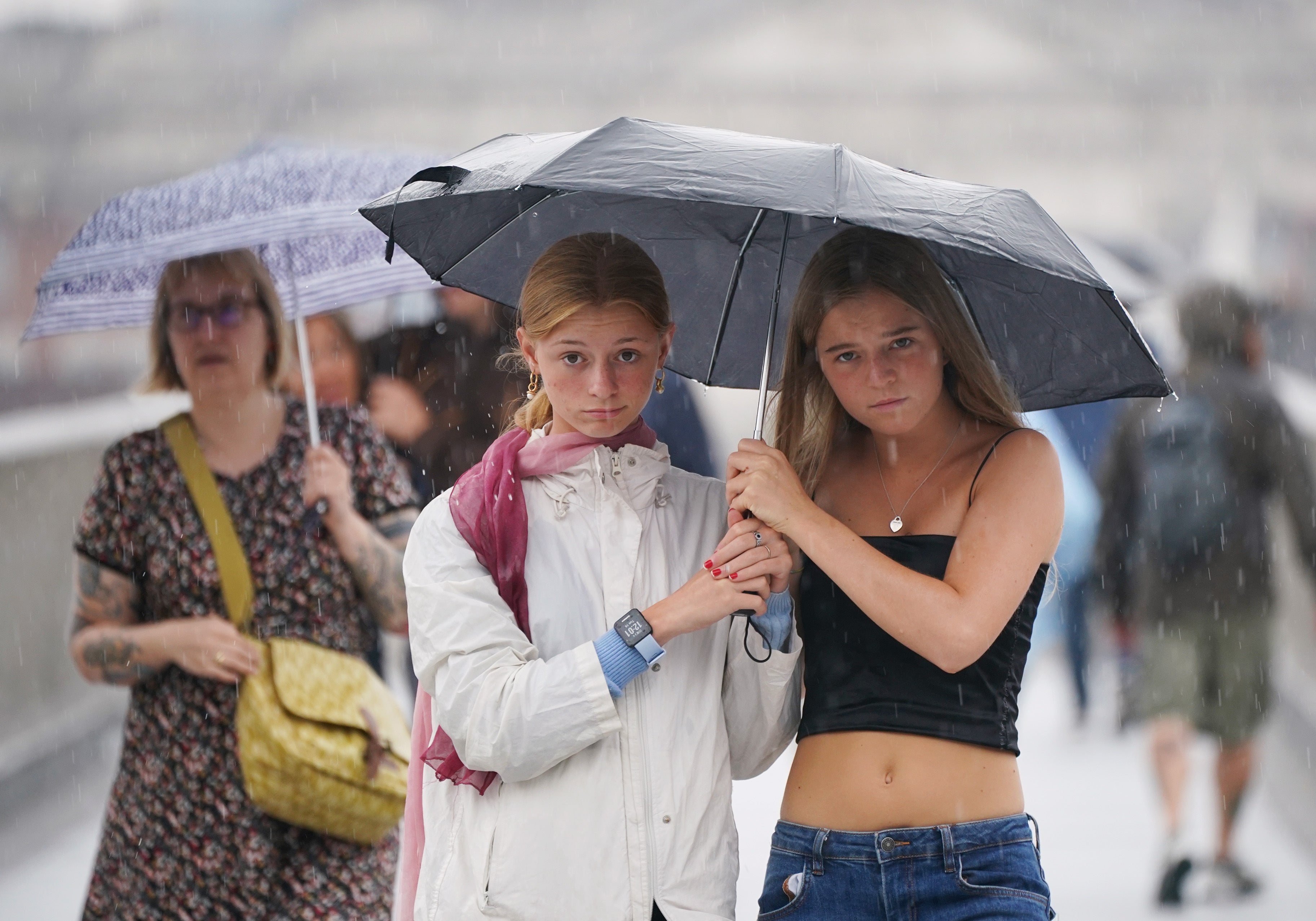 Flooding is likely to affect homes and businesses ‘quickly’ (Yui Mok/PA)