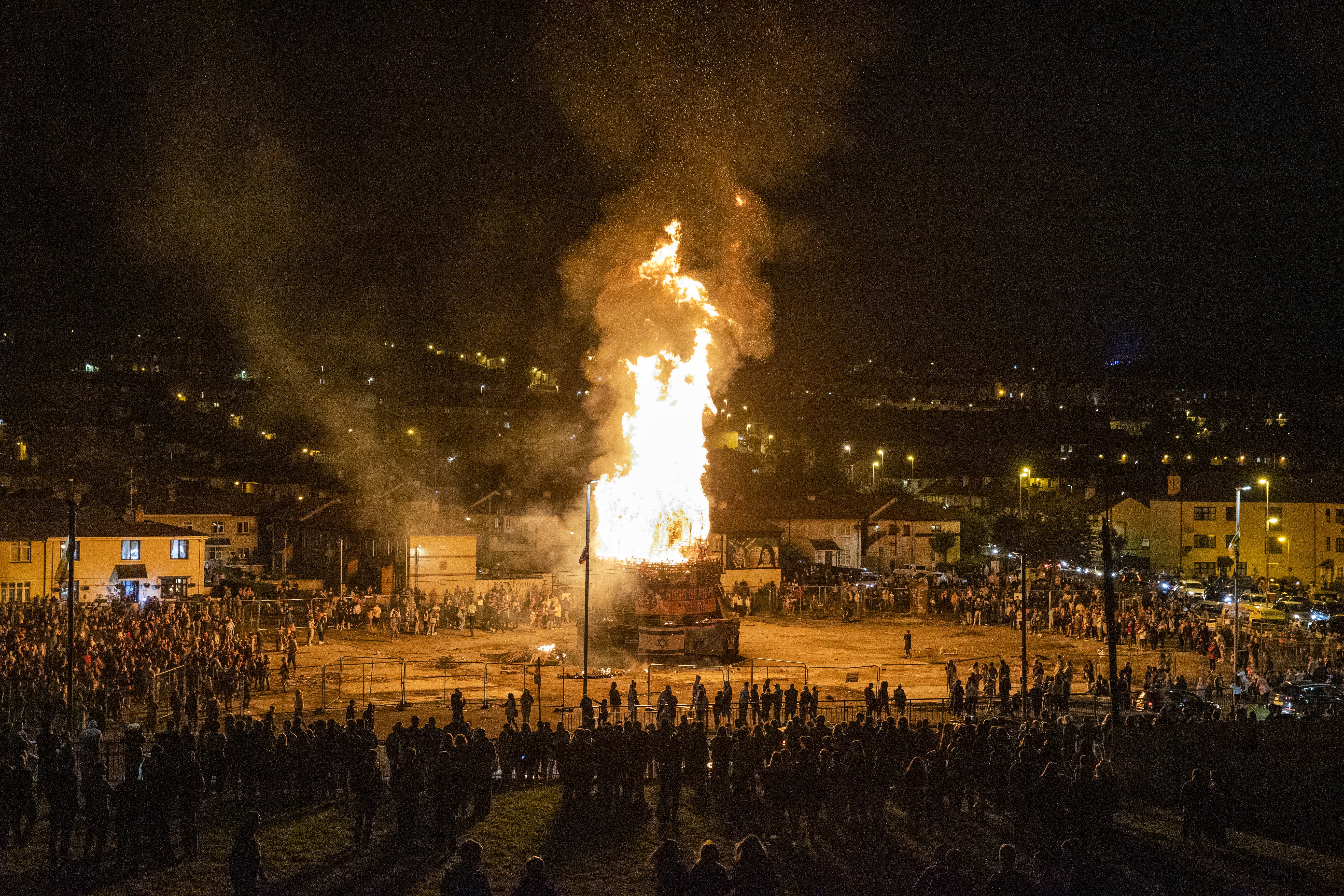 Police continue to investigate reports that shots were fired at a nationalist bonfire in Londonderry (PA)