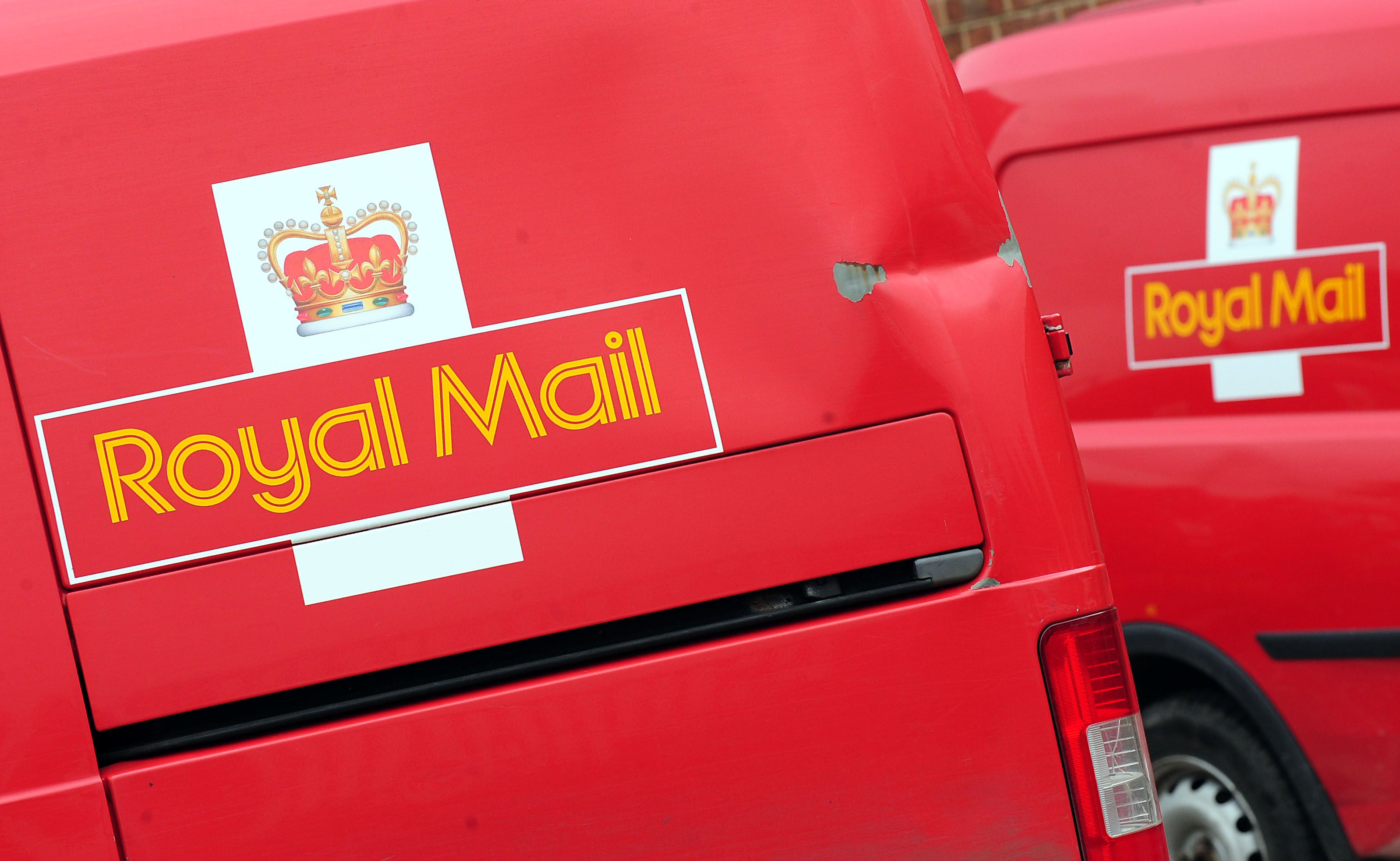 Royal Mail workers have voted to strike in a dispute over terms and conditions (Rui Vieira/PA)