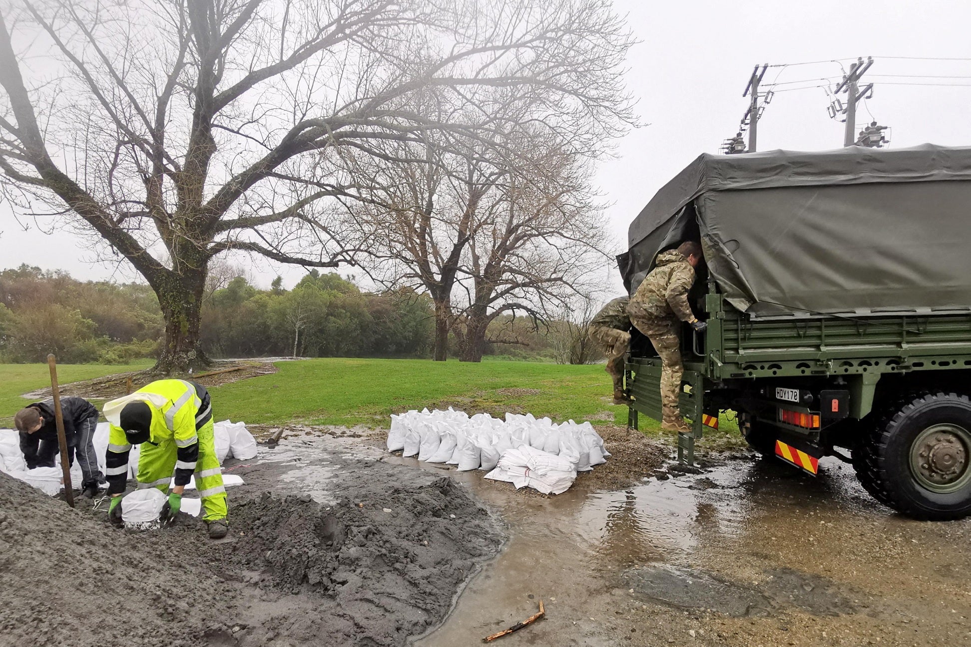 Members of the New Zealand defence force provide support in Westport