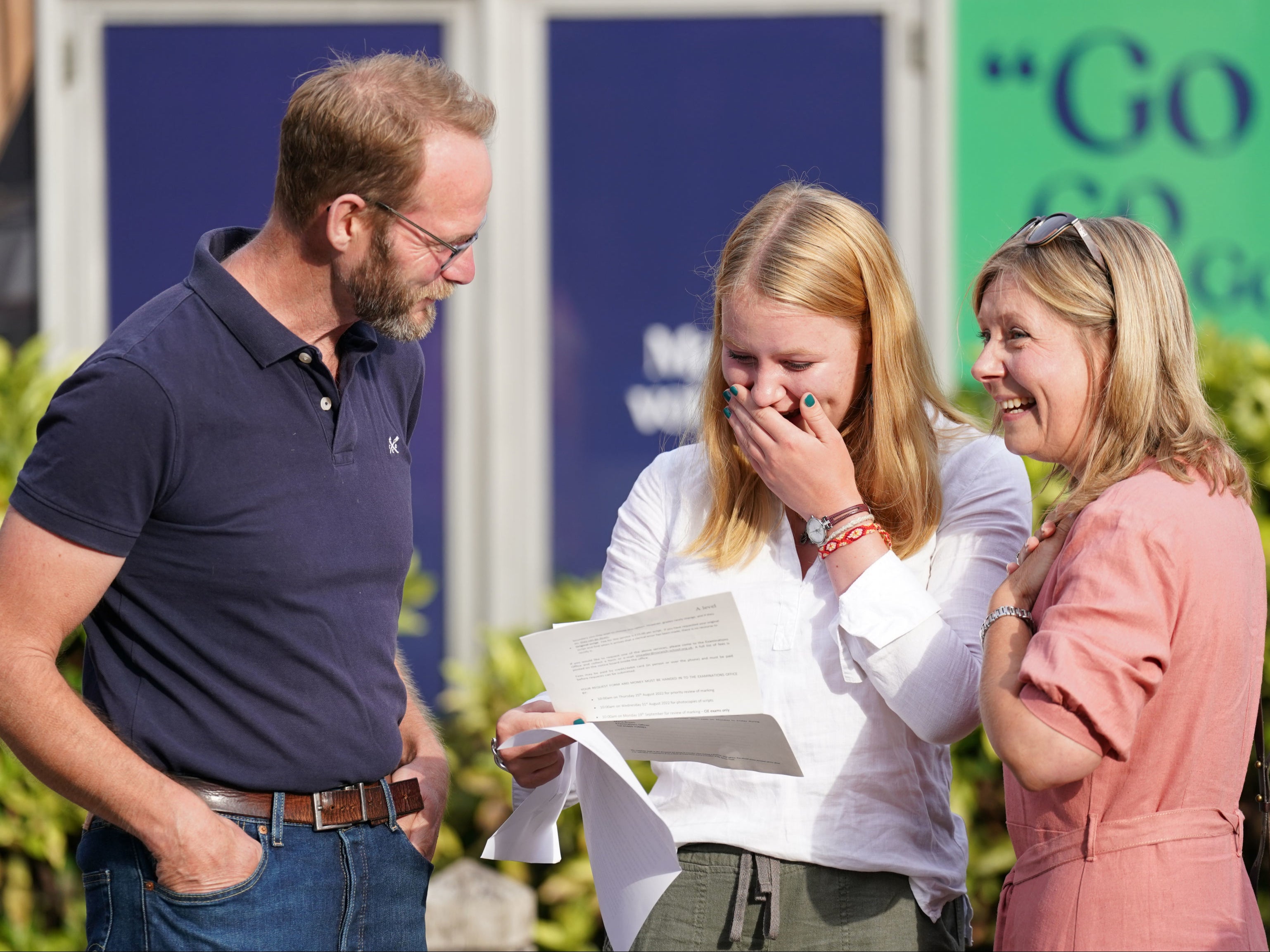 A students reacts when reading their A-level results at Norwich School