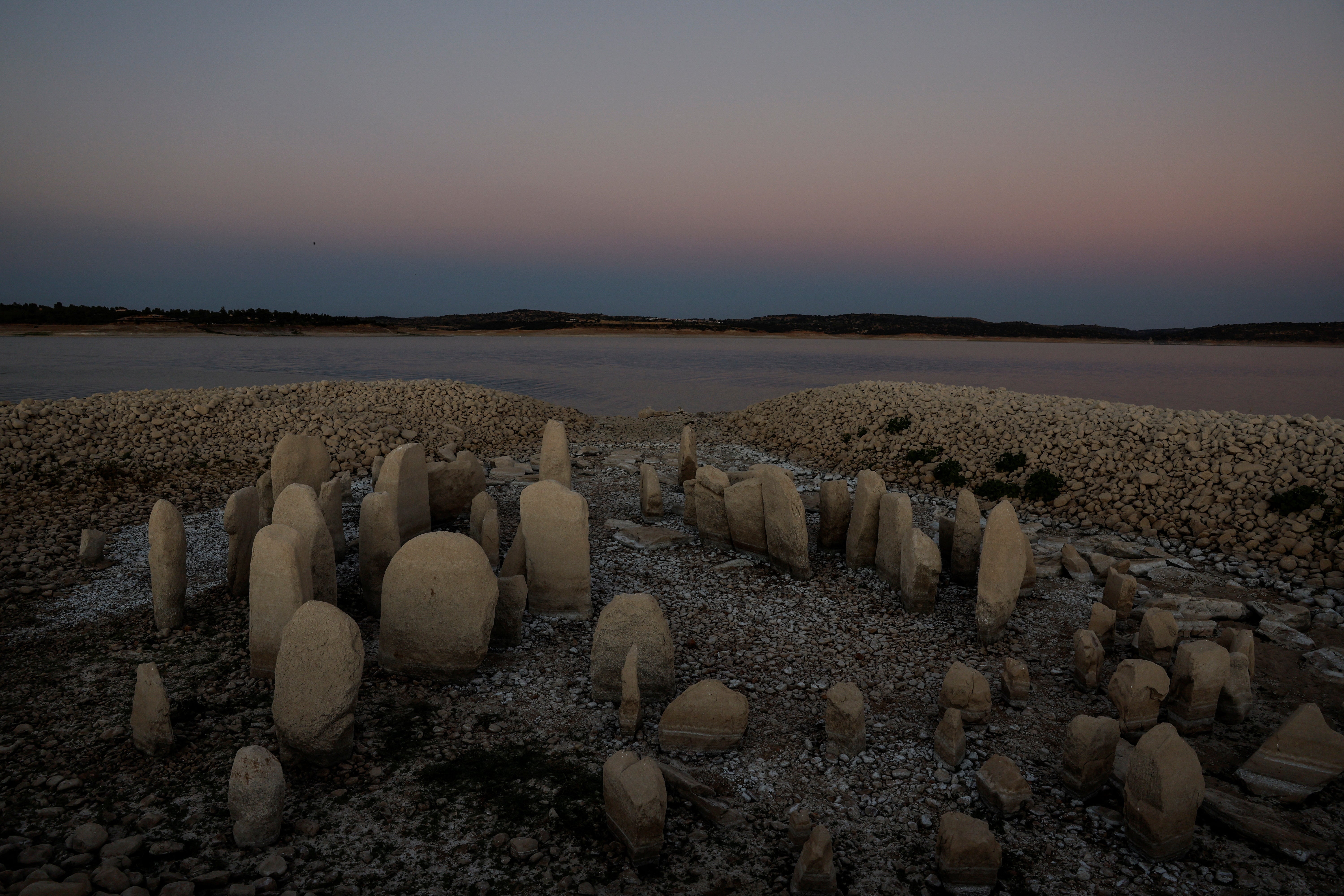 The dolmen of Guadalperal, also known as the Spanish Stonehenge, seen due to receding waters in the Valdecanas reservoir near El Gordo, Spain