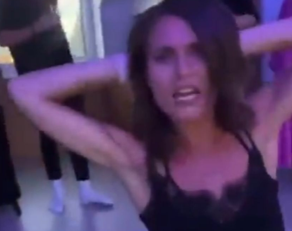 Screenshot of Ms Marin dancing at a house party with her friends