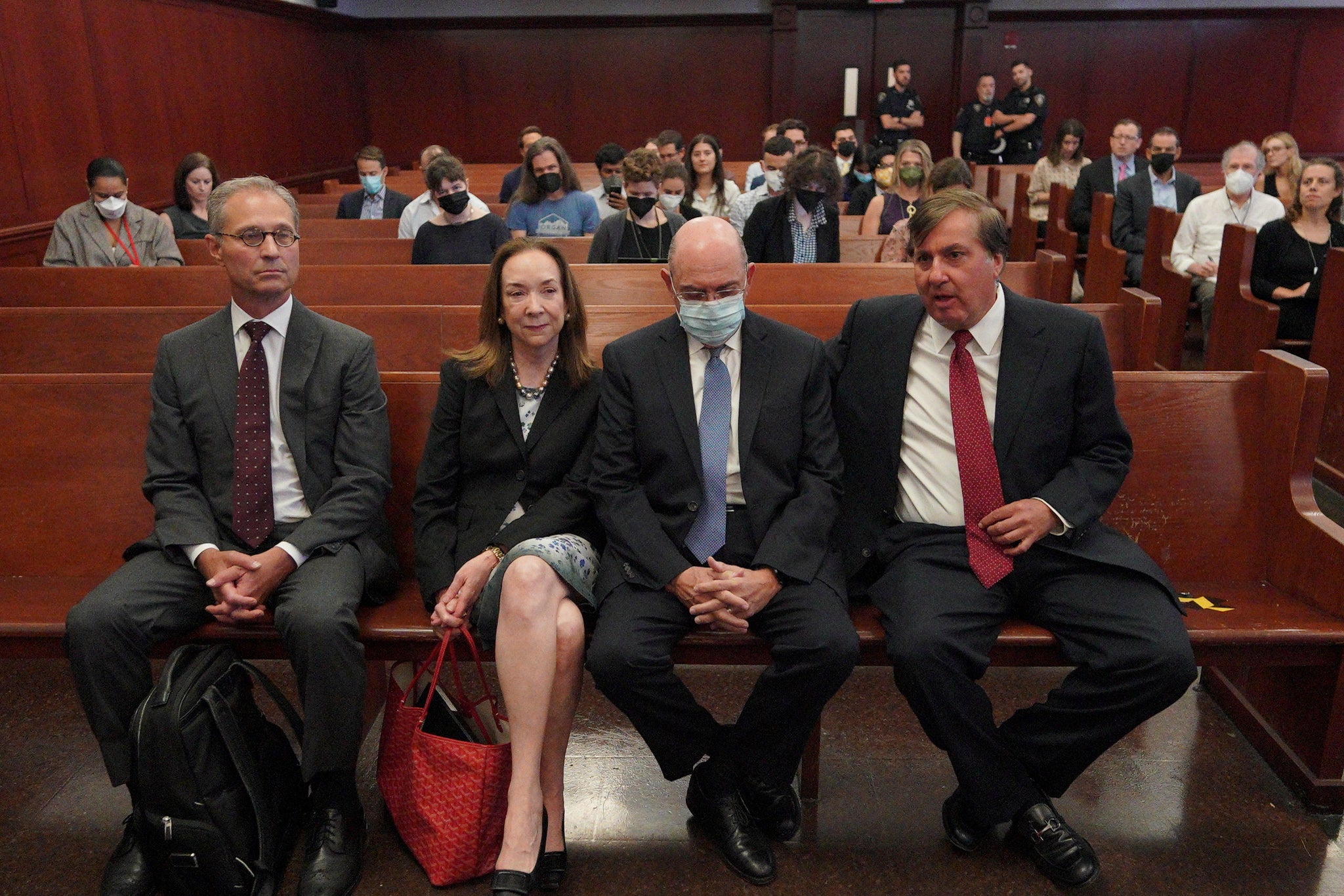 Weisselberg, second from right, sits in New York State Supreme Court