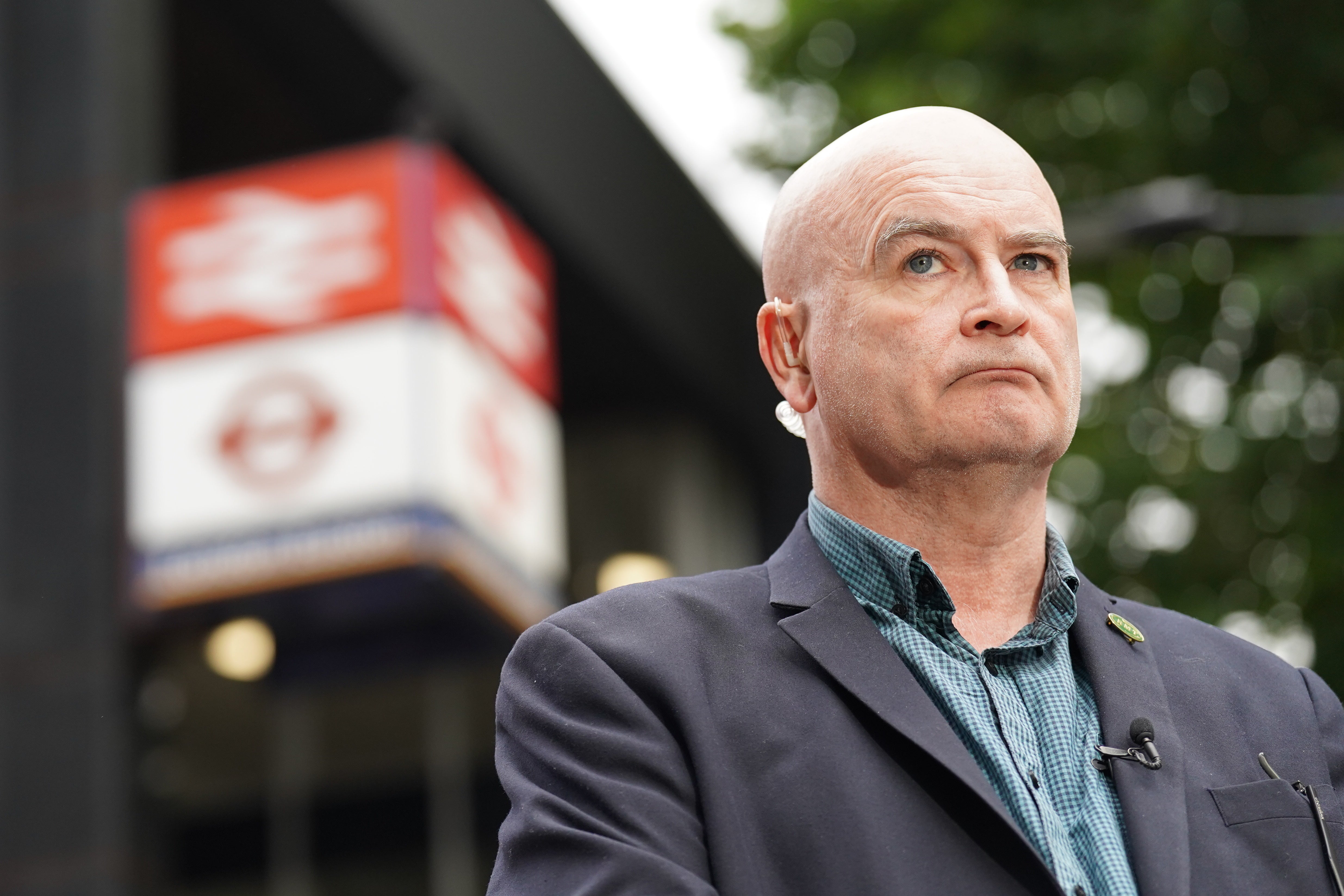 Mick Lynch, general secretary of the Rail, Maritime and Transport union (RMT) on the picket line outside London Euston train station (PA)