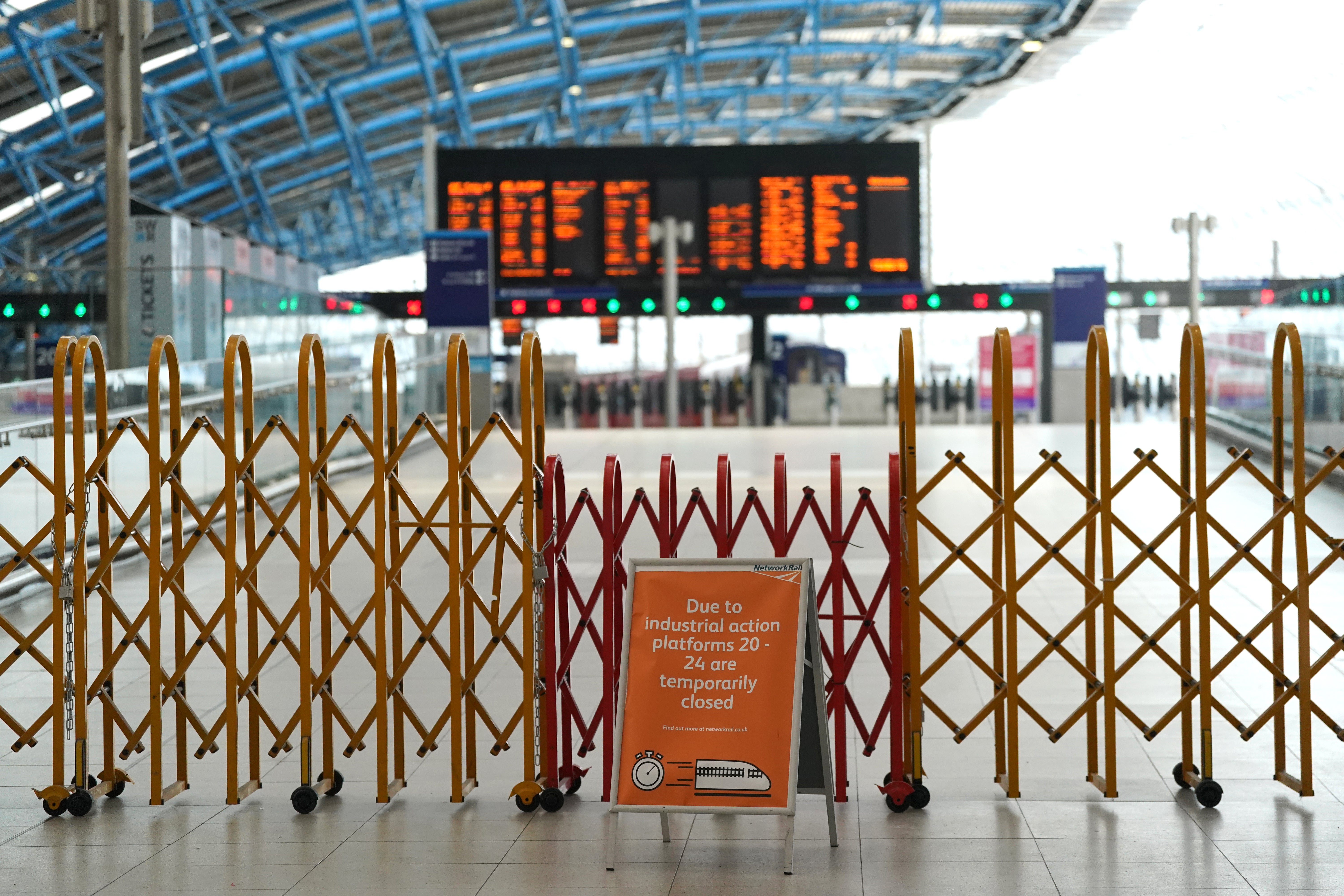 Rail unions have reacted furiously to a warning by the Transport Secretary that changes employers are seeking, which are at the heart of the current train strikes, could be imposed (PA)