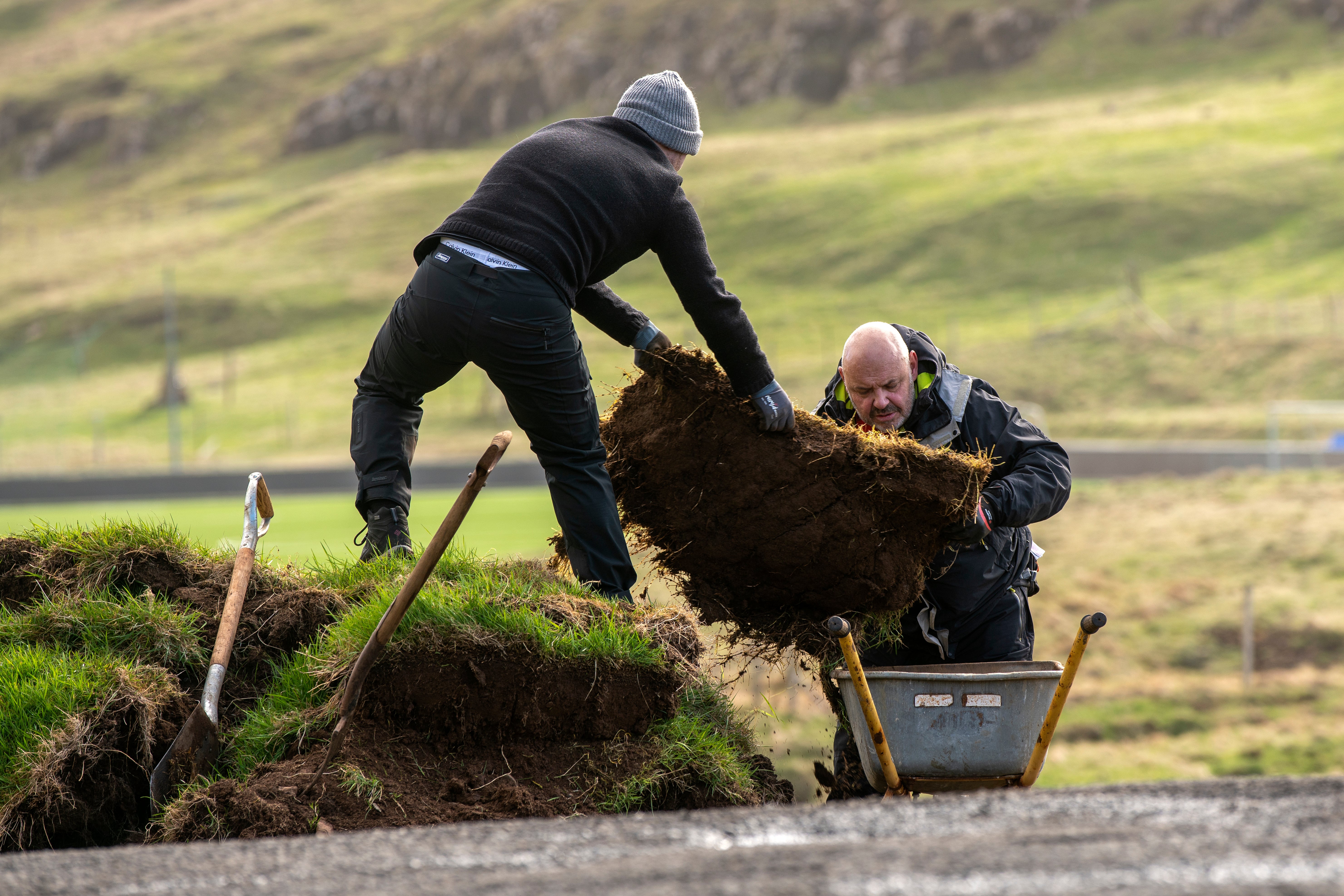 Volunteers complete tasks like laying new paths