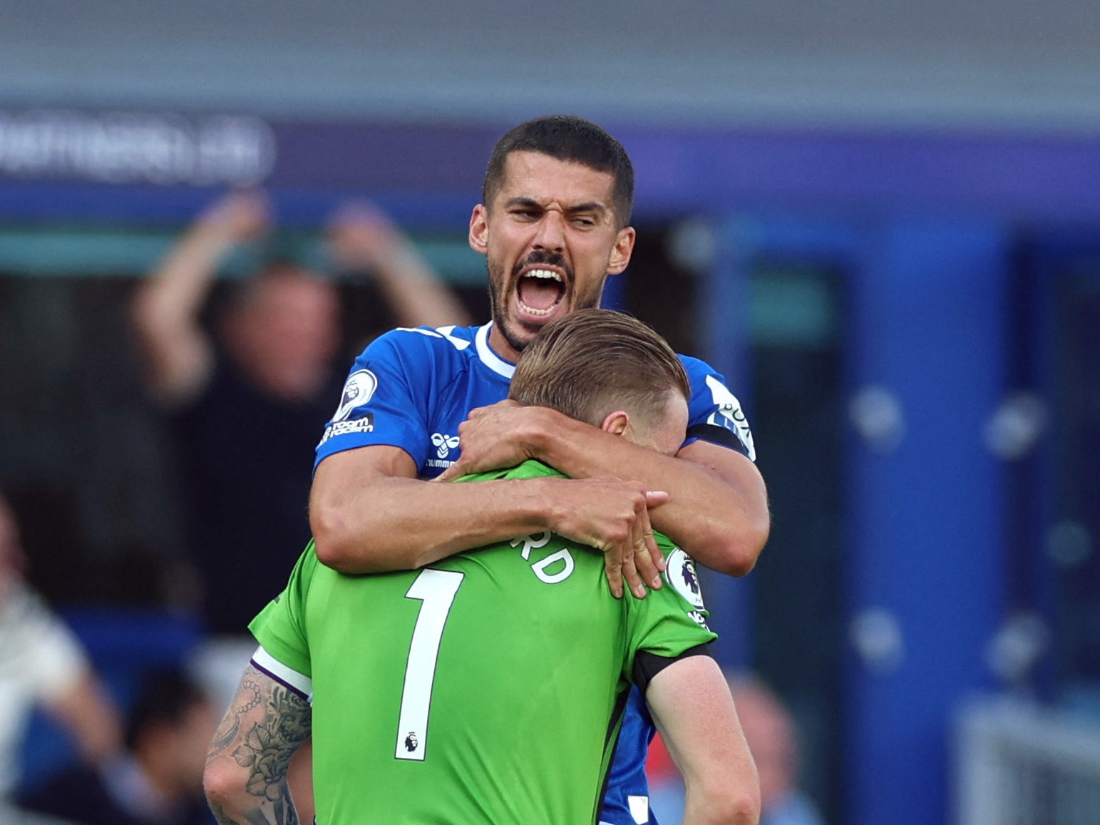 Everton’s Conor Coady and Jordan Pickford celebrate after Demarai Gray’s late equaliser