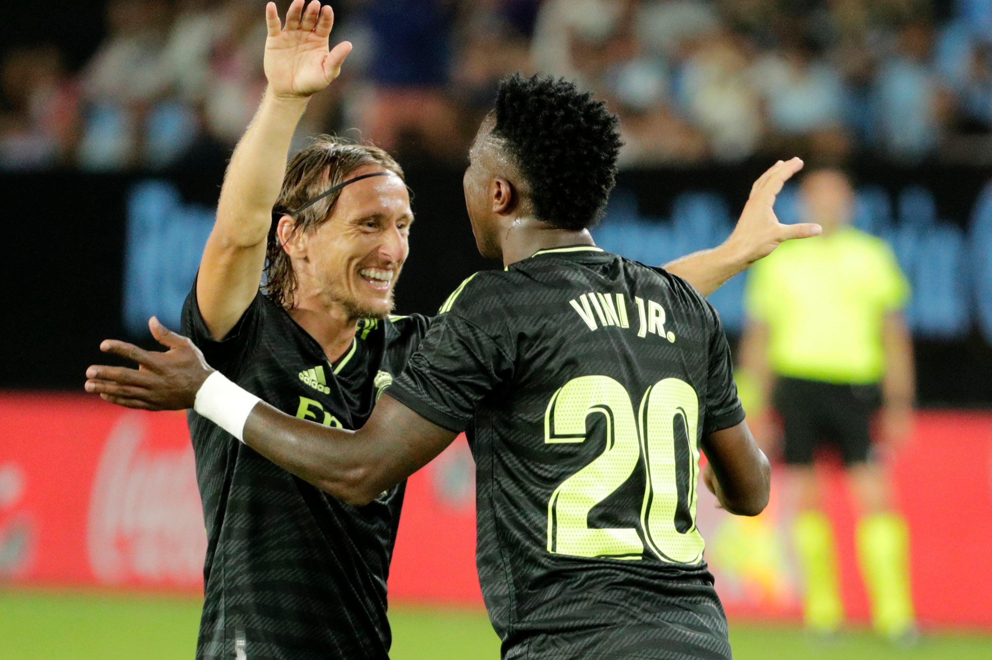 Luka Modric, left, and Vinicius Junior celebrate Real Madrid’s third goal (Lalo R. Villar/AP)