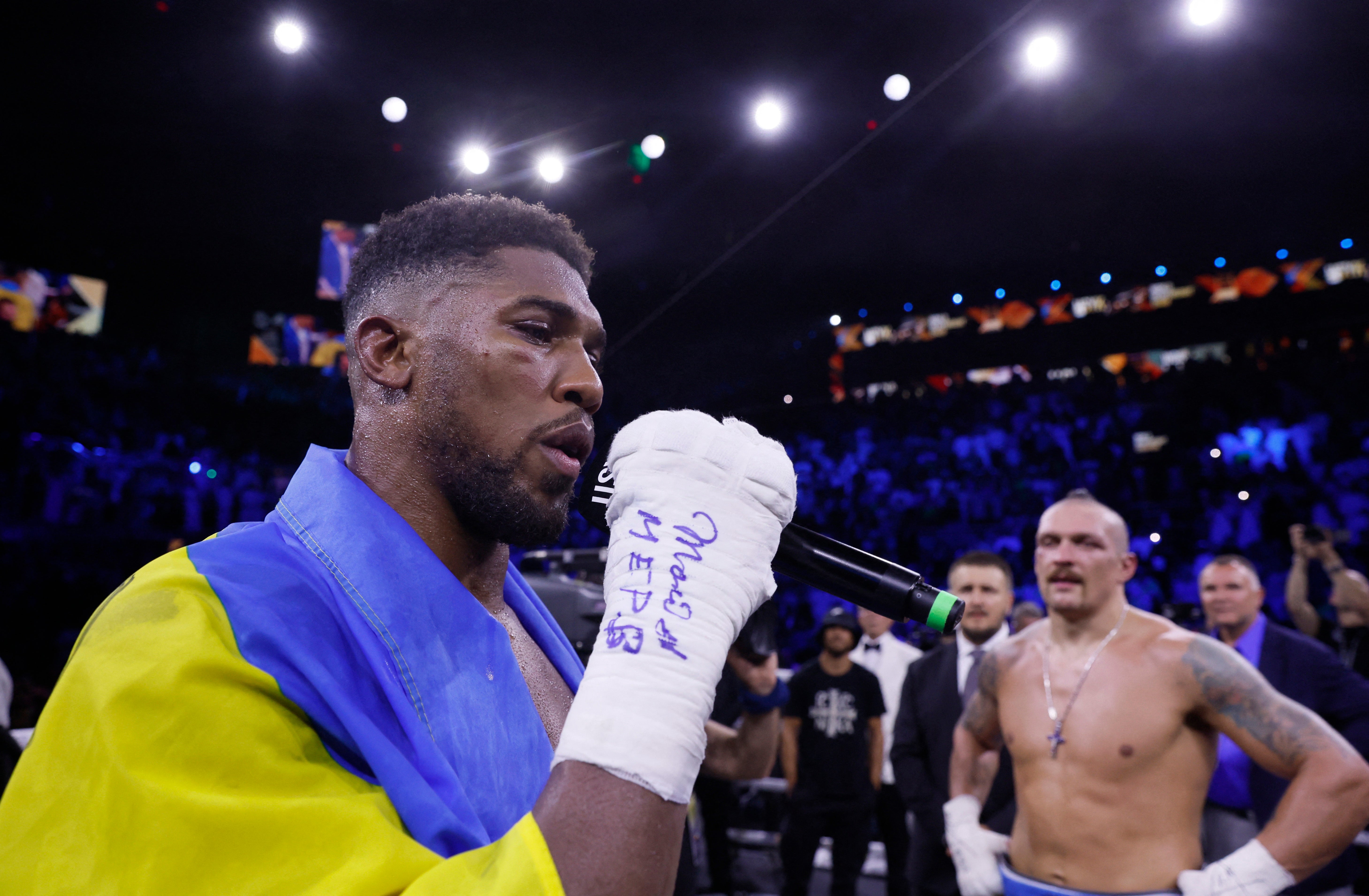 Joshua seized a microphone after the fight and delivered a bizarre speech