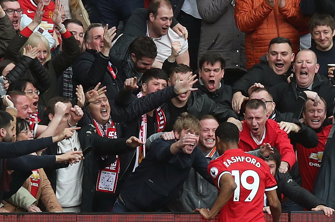 Marcus Rashford celebrates scoring against Liverpool in 2018 (Martin Rickett/PA)