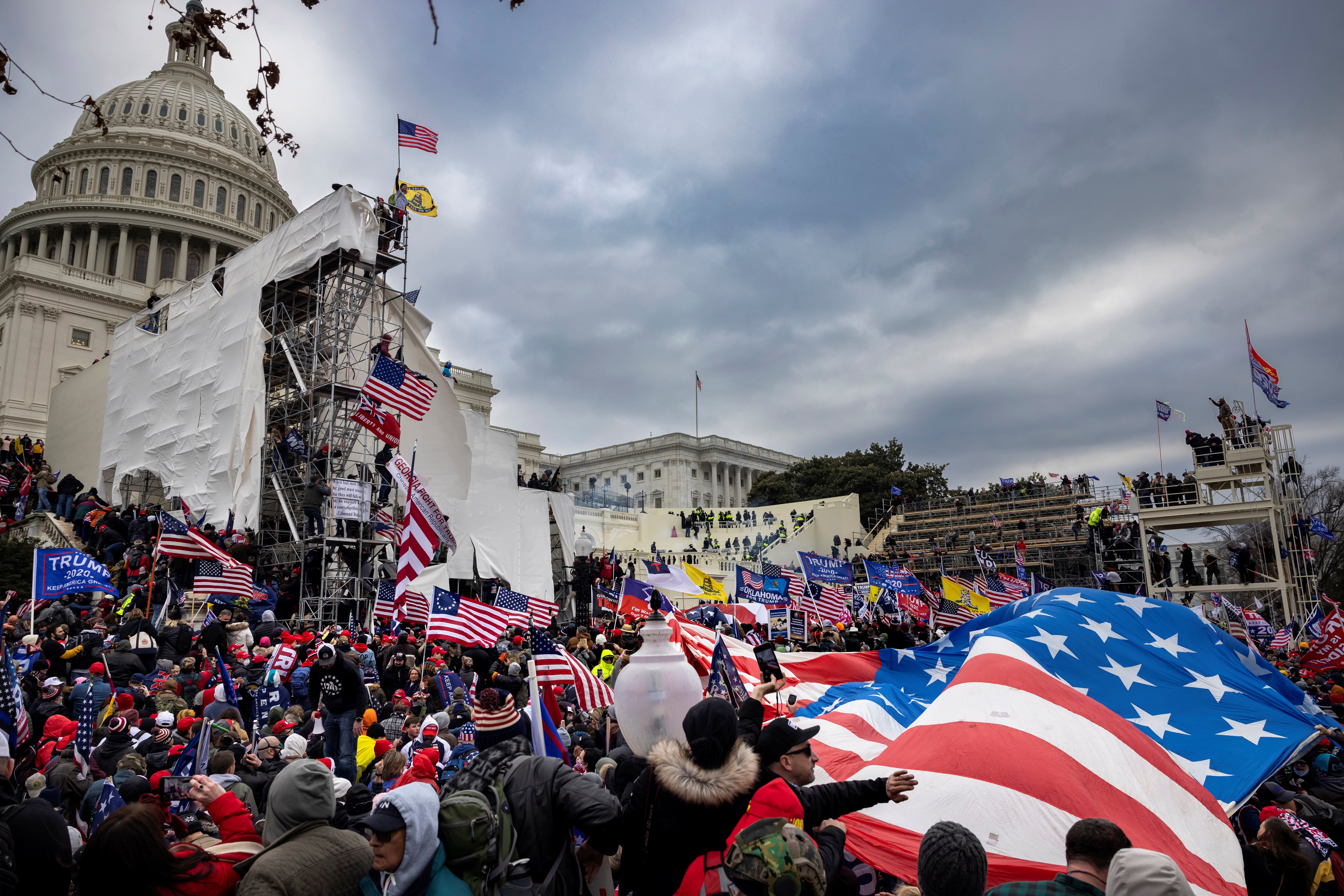 Trump supporters clash with police and security forces as they try to storm the US Capitol on 6 January 2021