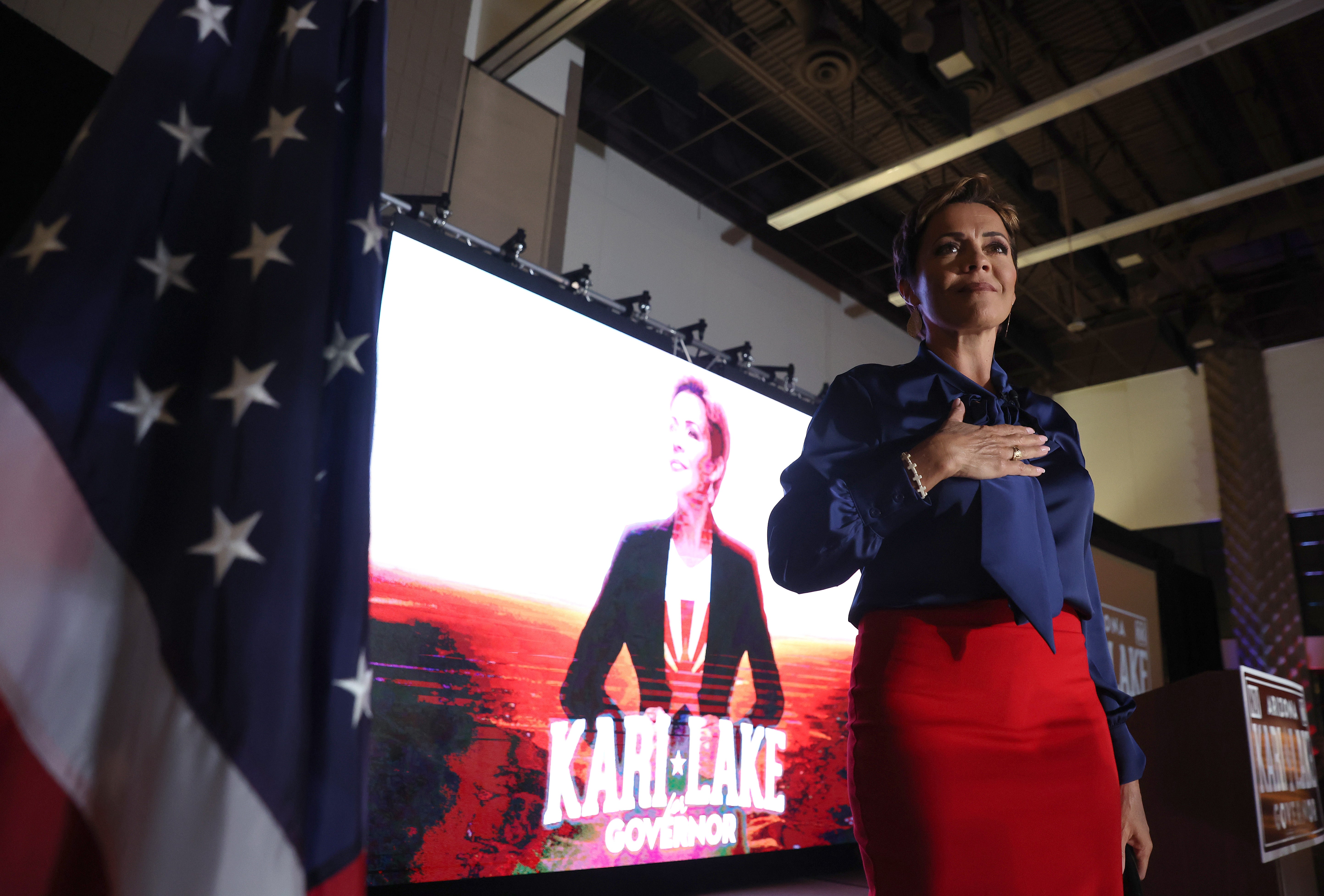 Republican candidate Kari Lake greets supporters at an election-night gathering in Scottsdale, Arizona