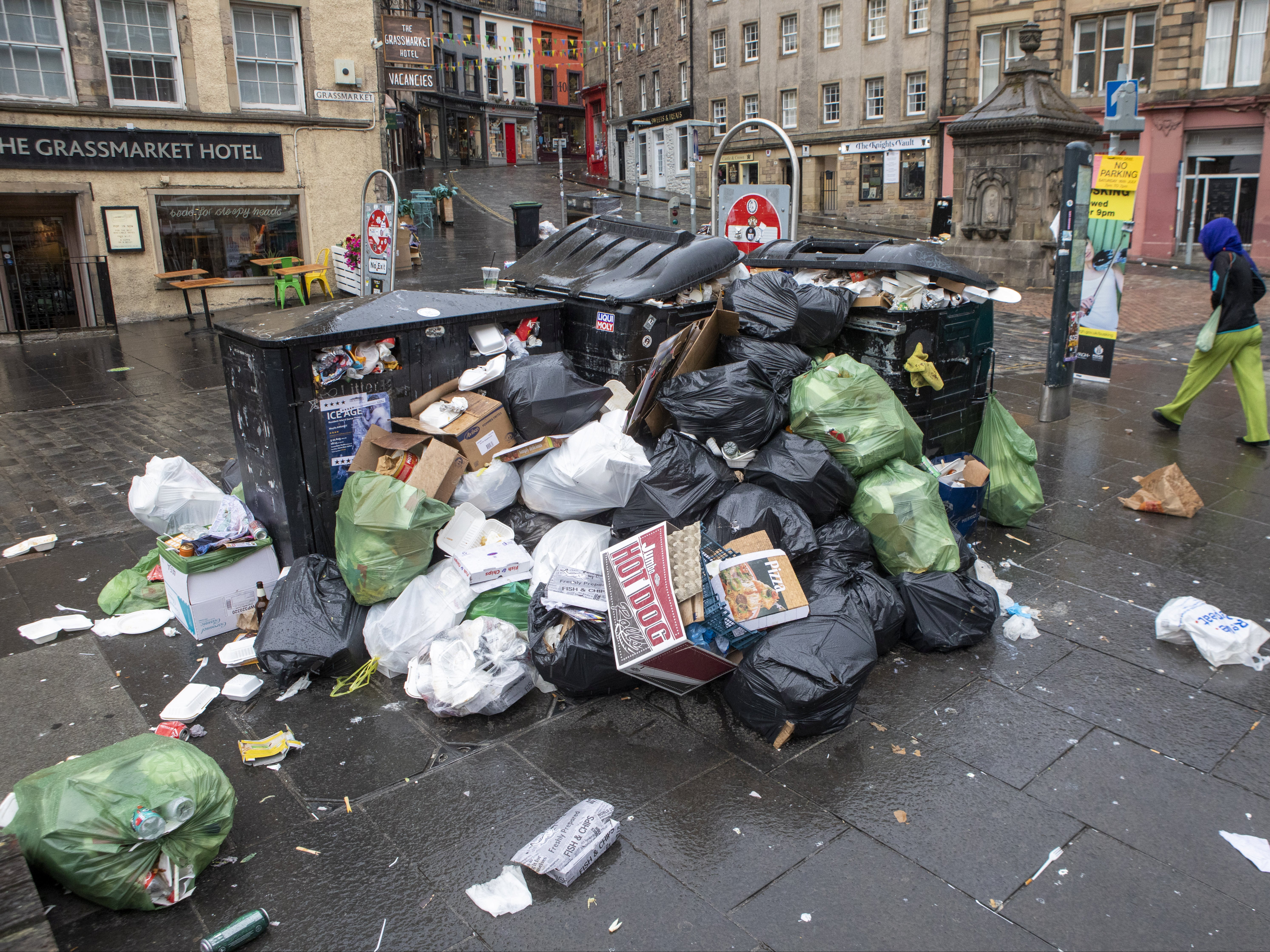 Rubbish bags and takeaway boxes mount up outside The Grassmarket Hotel