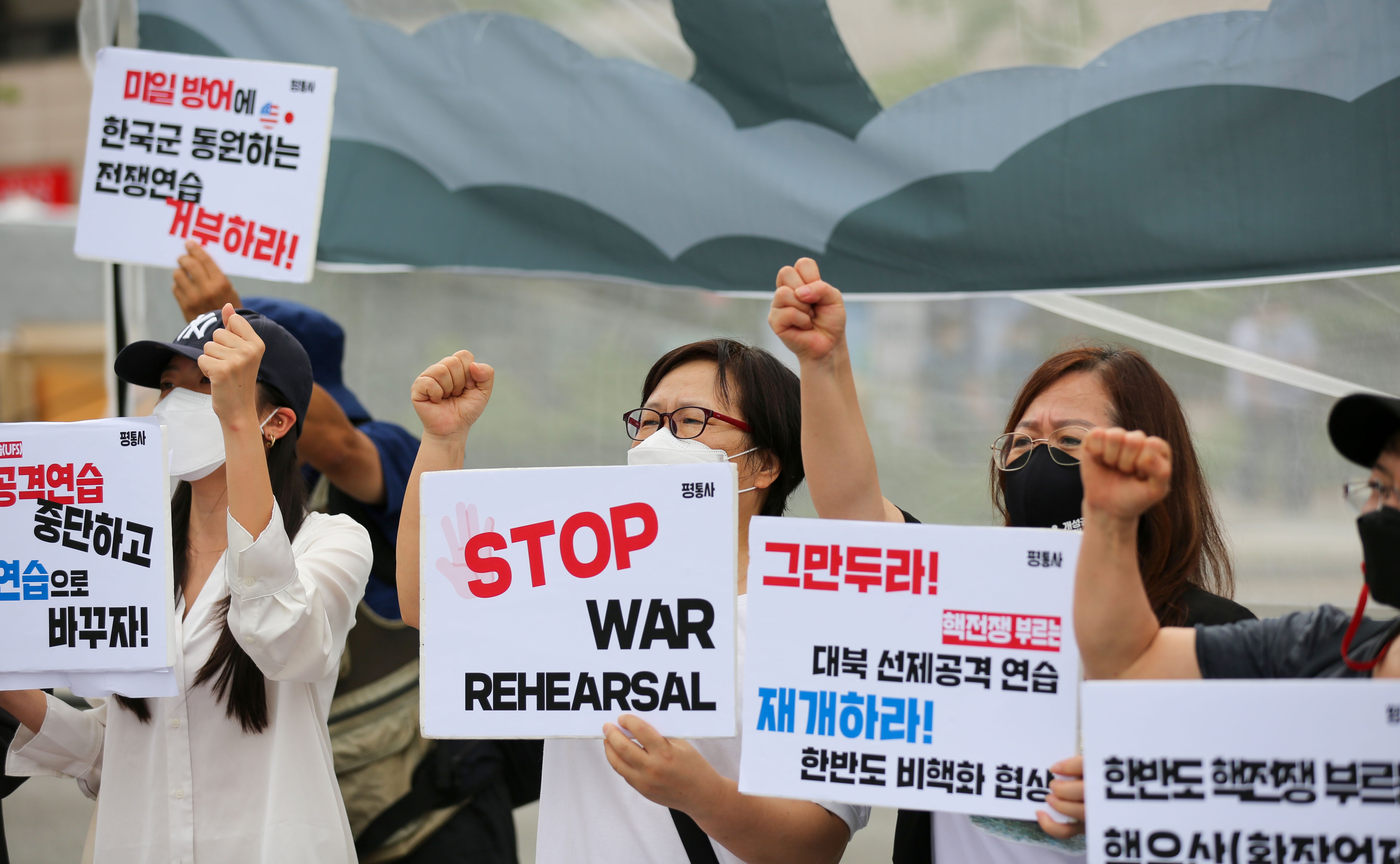 Protesters hold a rally against the South Korea-US military exercise in central Seoul