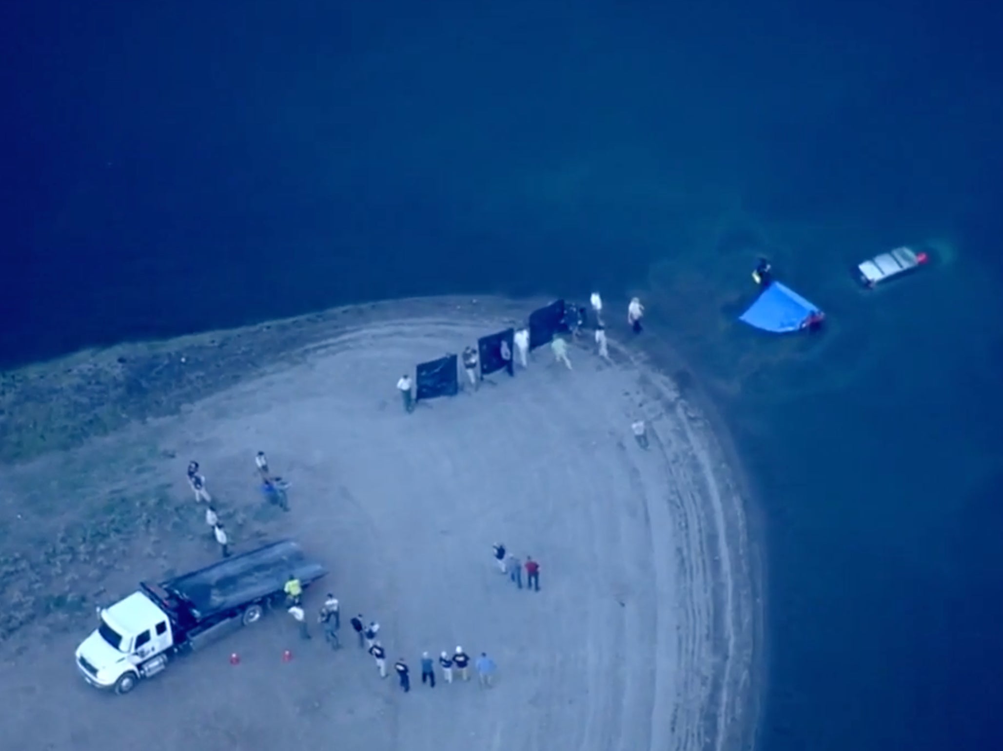 Helicopters for KCRA-TV pictured the vehicle being retrieved from the Prosser Creek Reservoir