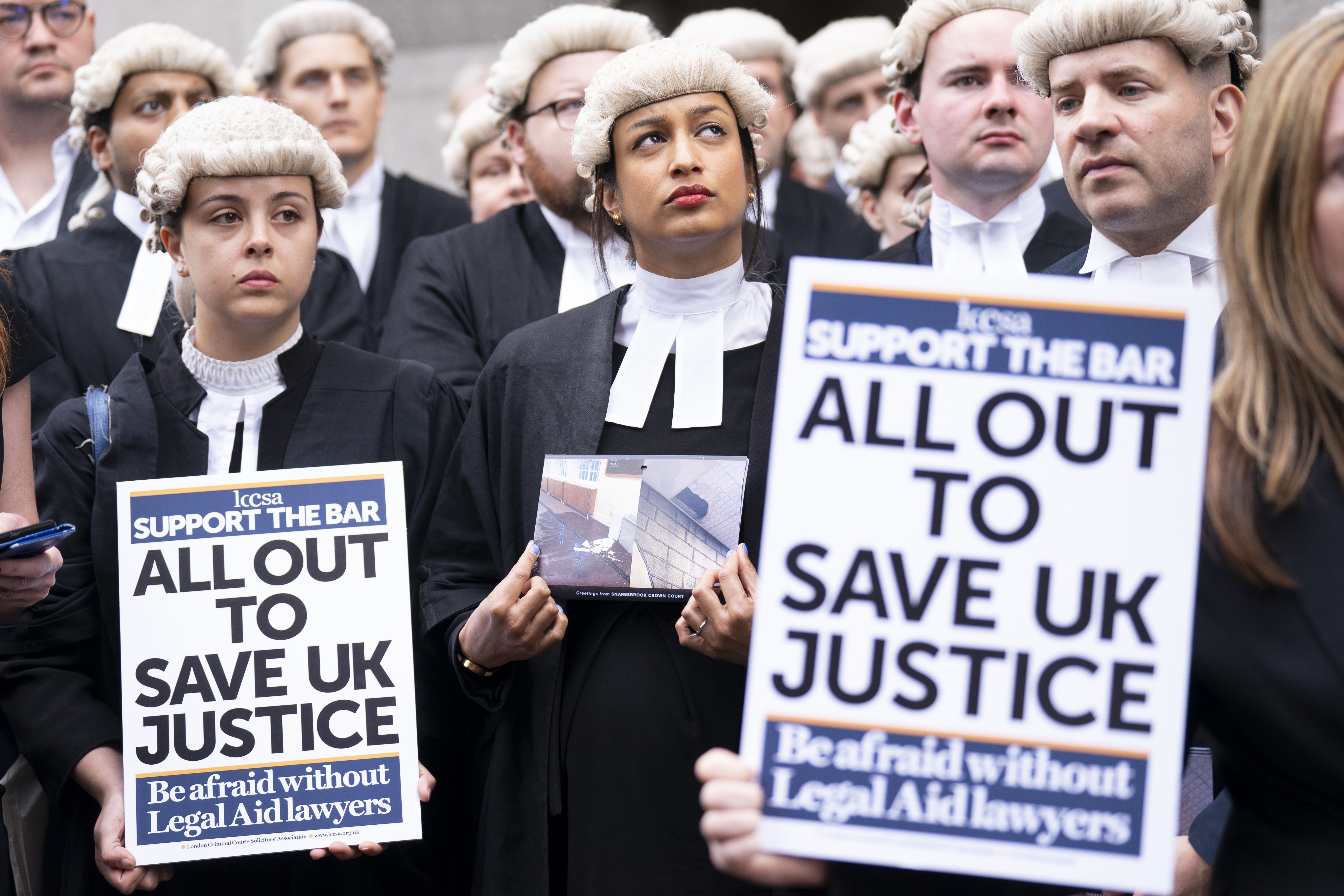 Barristers strike outside the Old Bailey in London in June