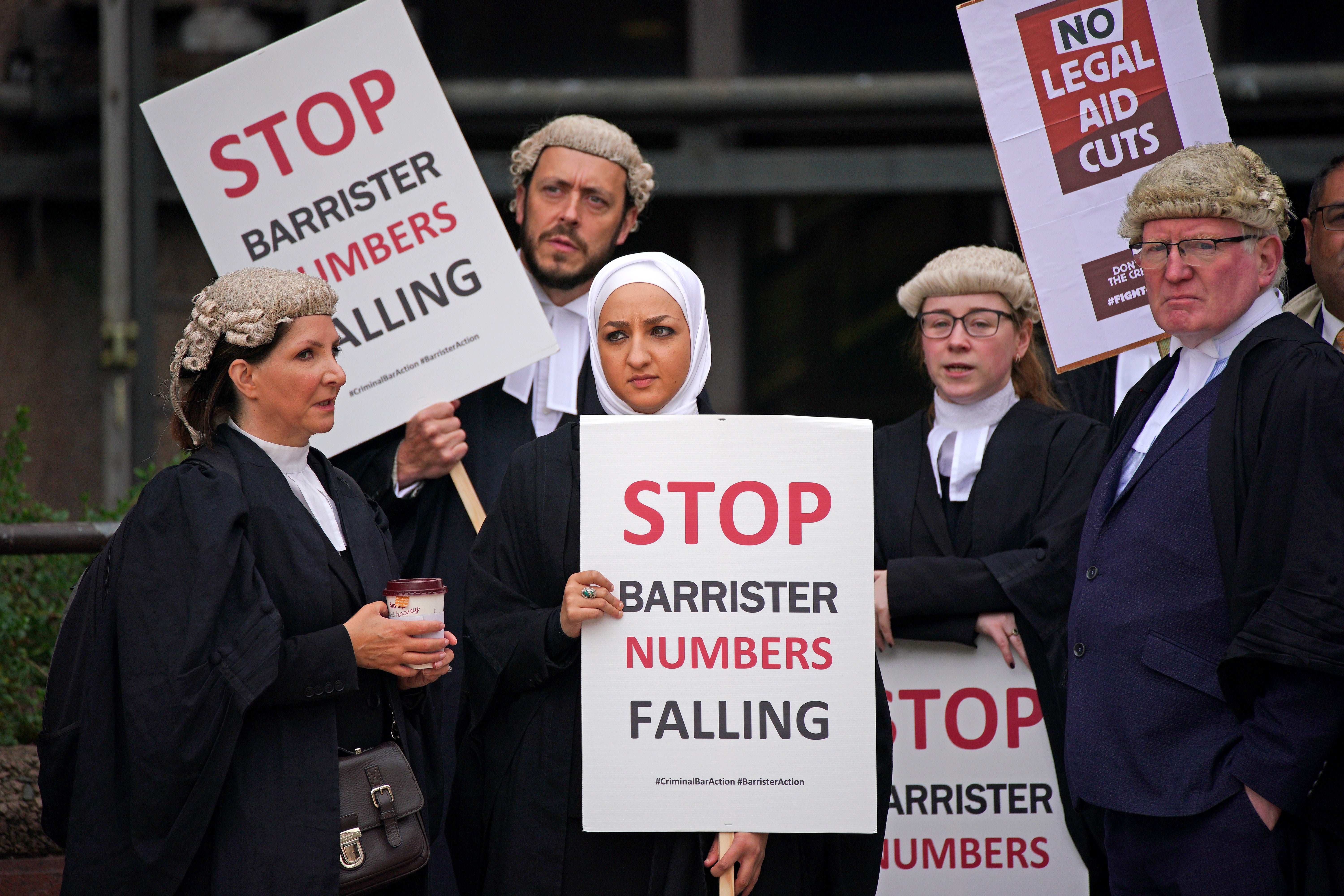 Barristers gather outside Liverpool Crown Court during a walk-out in july