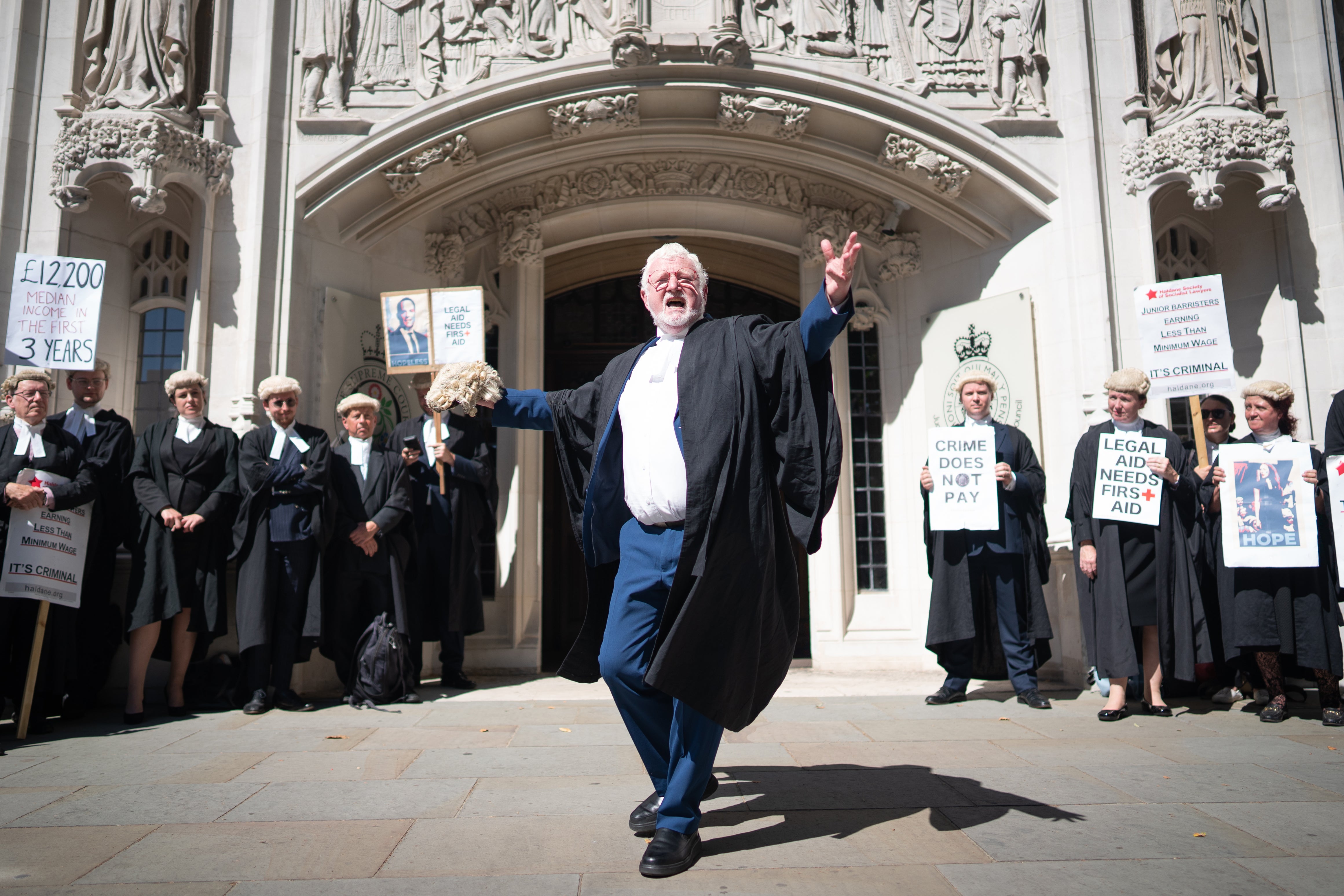 Former Tory MP Jerry Hayes joins fellow criminal defence barristers on picket lines outside the Supreme Court in Westminster in July