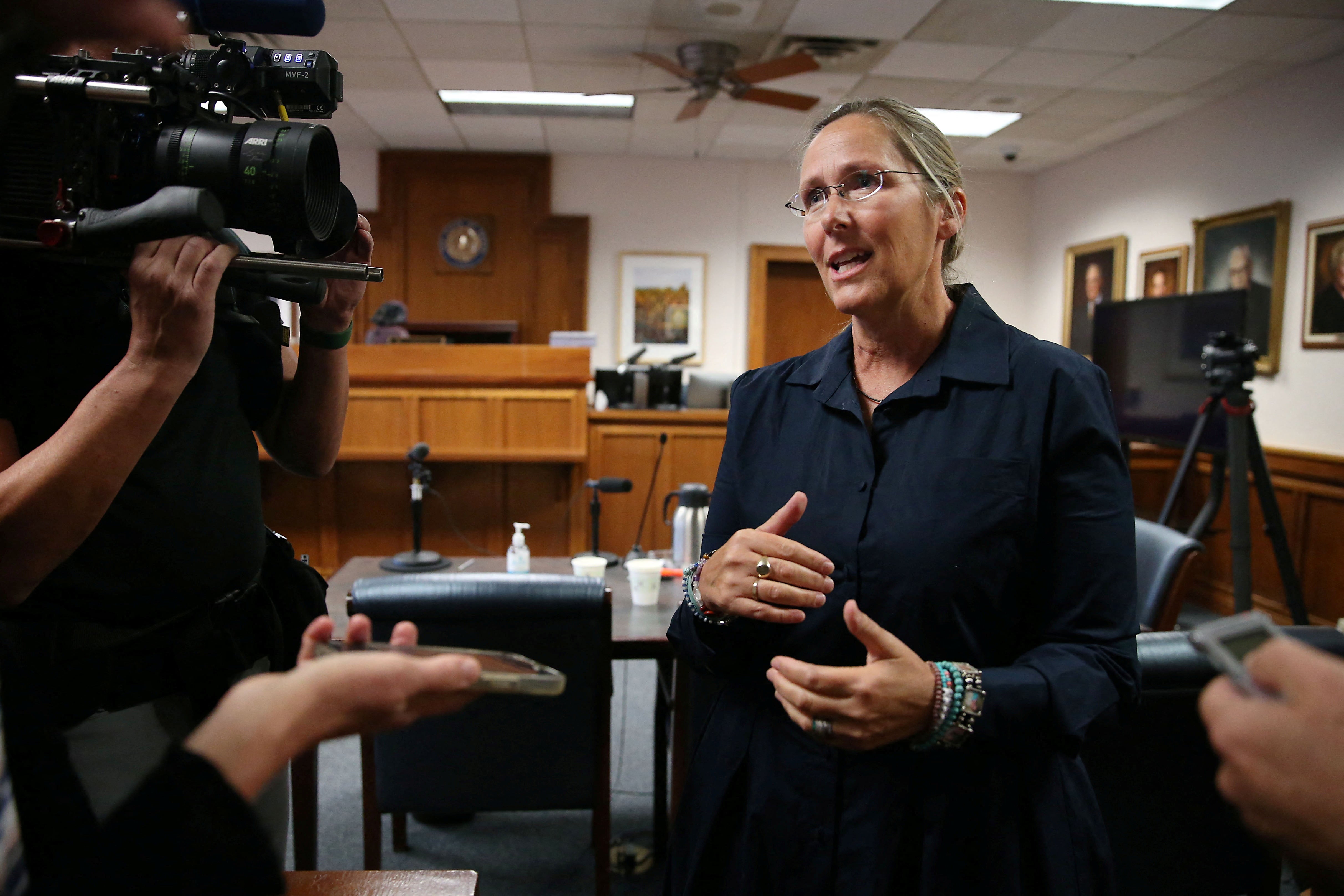 Scarlett Lewis, mother of 6-year-old Sandy Hook shooting victim Jesse Lewis, speaks with media after jurors return a punitive damages verdict of $45.2 million against Alex Jones at the Travis County Courthouse in Austin, Texas, U.S. August 5, 2022