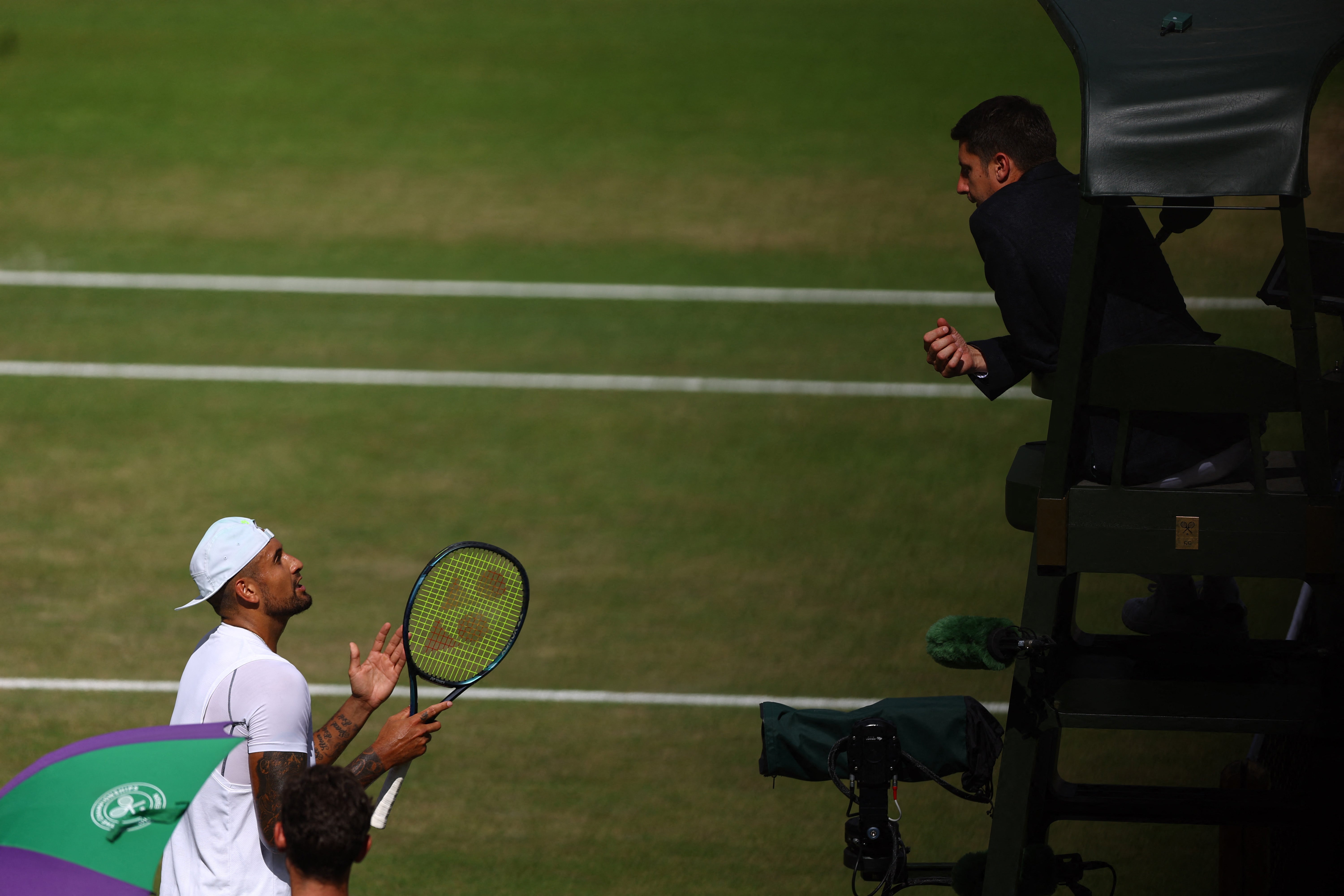 Kyrgios complains to the umpire during the men’s singles final at Wimbledon