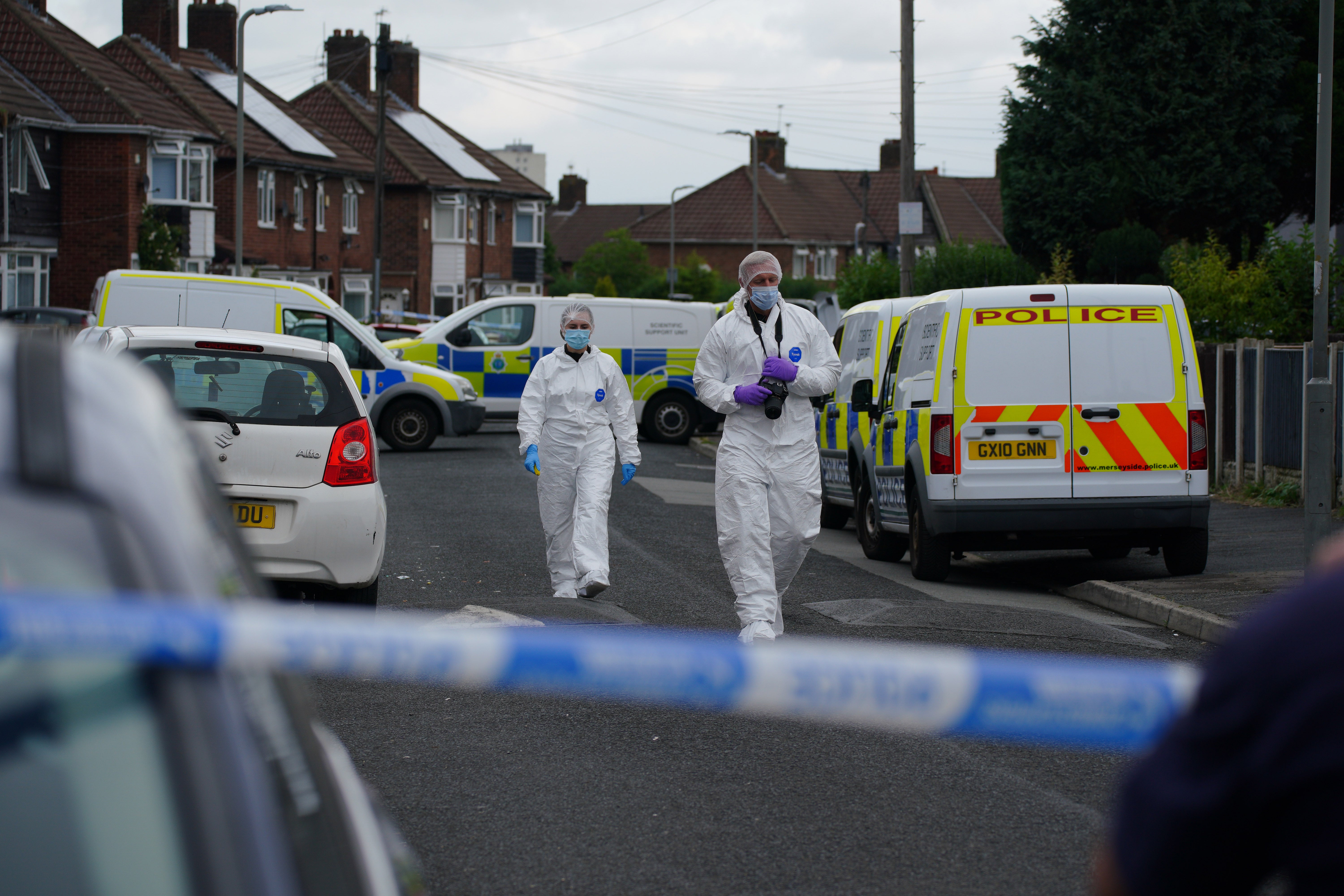 Forensic officers near to the scene in Kingsheath Avenue