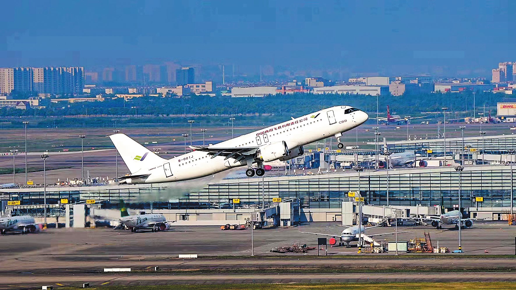 A C919 passenger jet takes off for a test flight at Shanghai Pudong International Airport on May 14, 2022