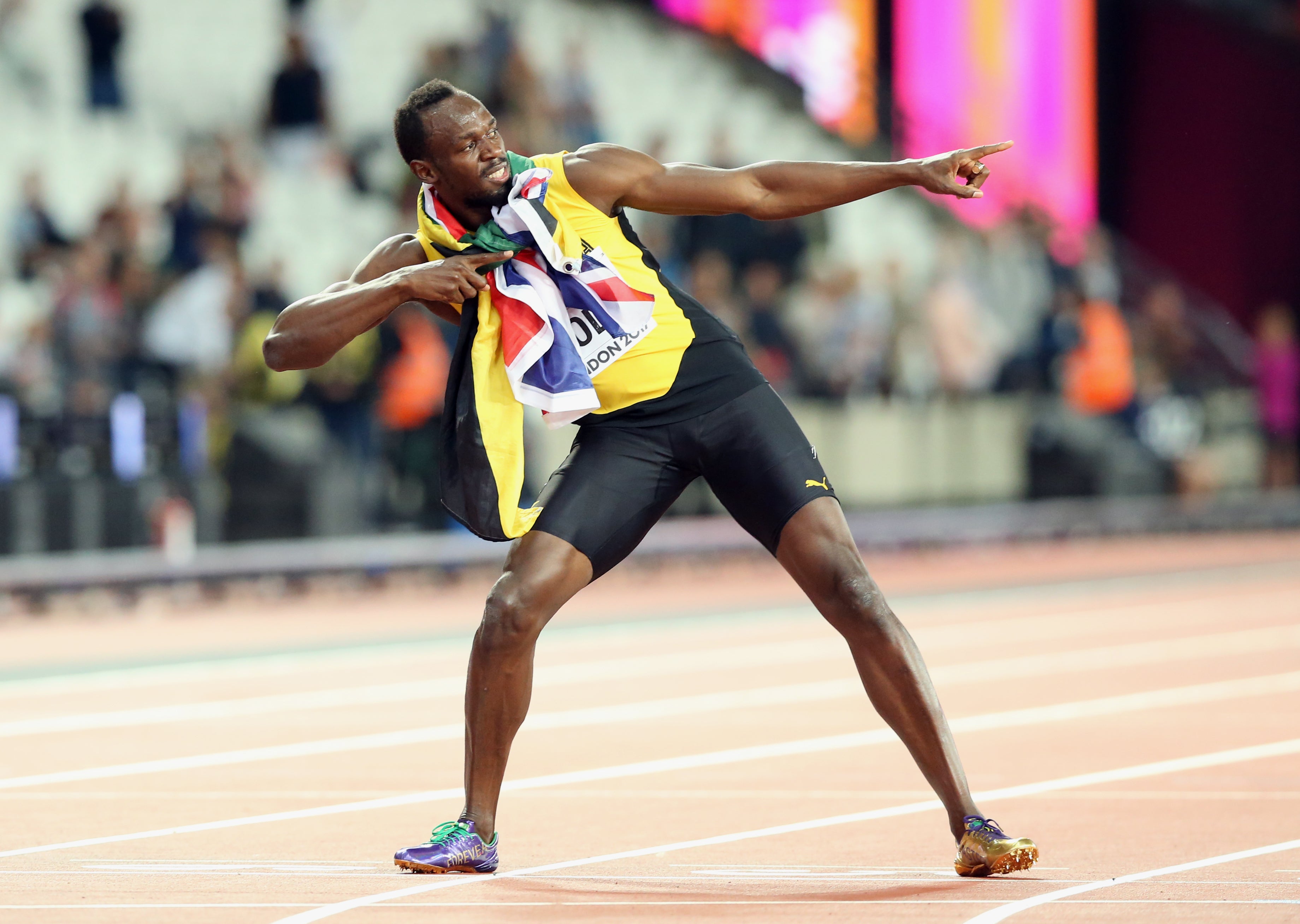 Usain Bolt’s trademark pose (Martin Rickett/PA)