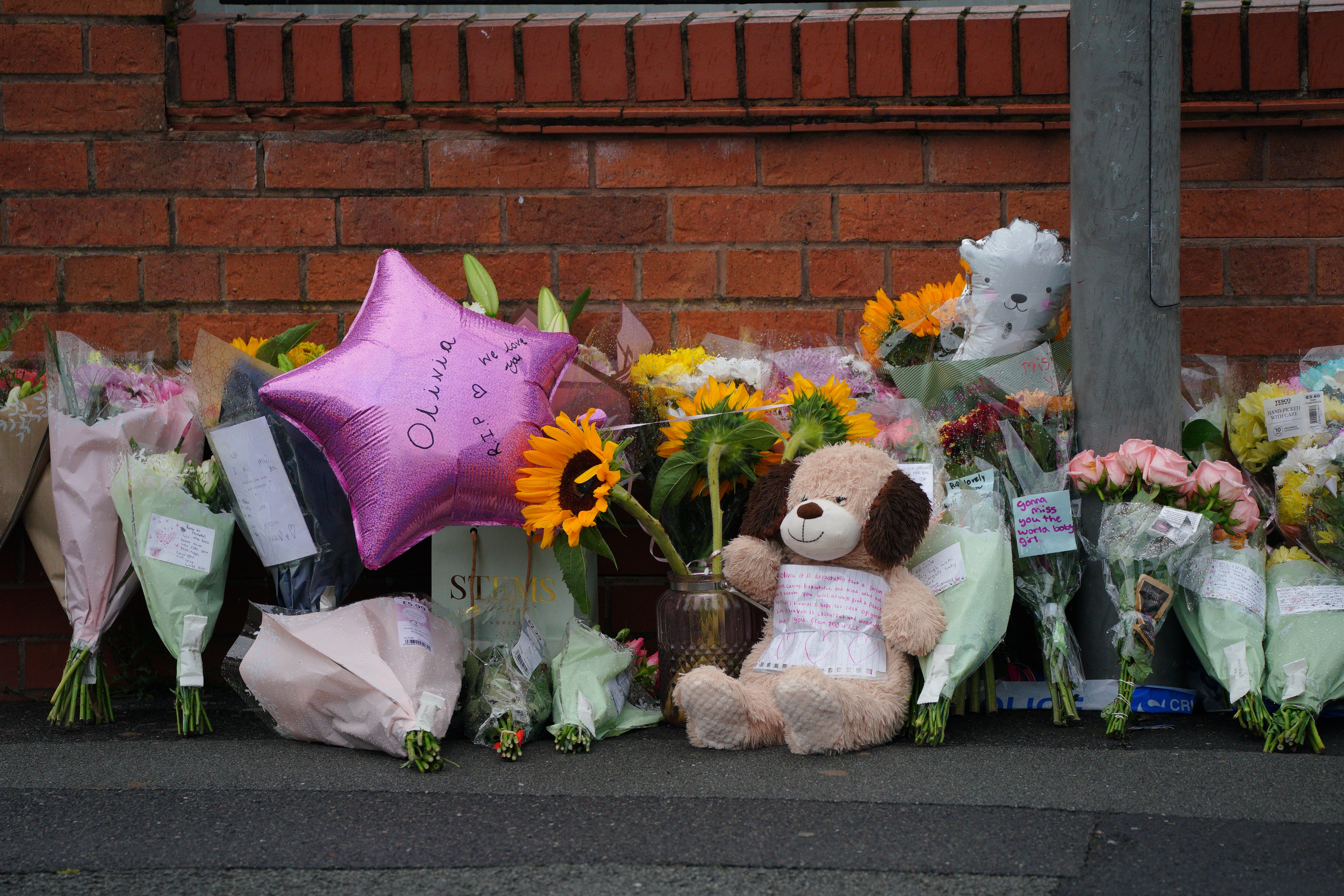 Tributes left in Kingsheath Avenue