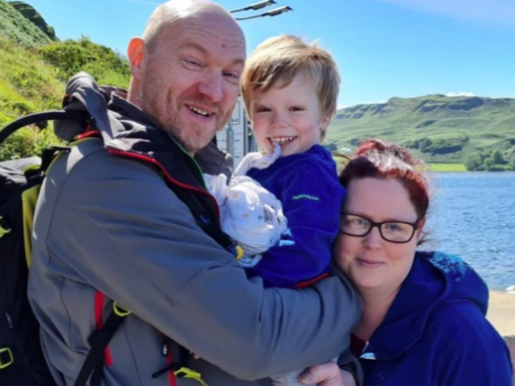 Arran Cochrane with his parents on holiday in Scotland