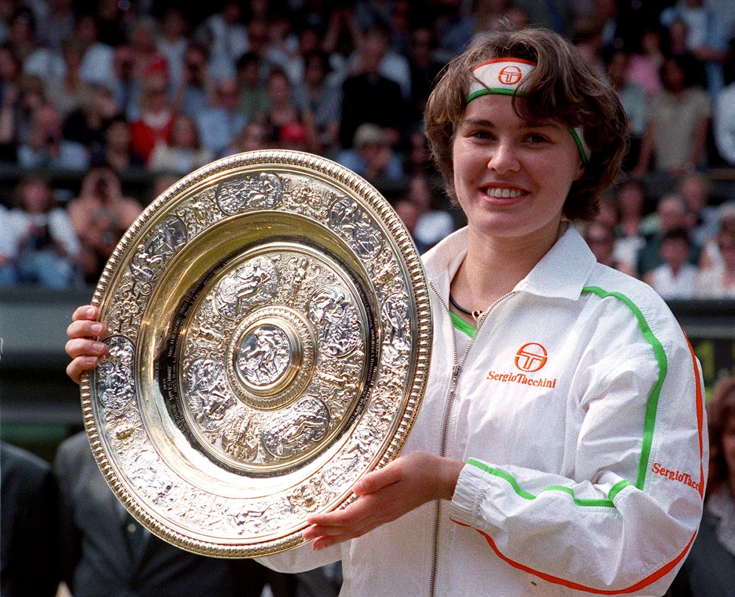 Martina Hingis won five Grand Slam titles in her teens, including Wimbledon at the age of 16 (PA Archive)