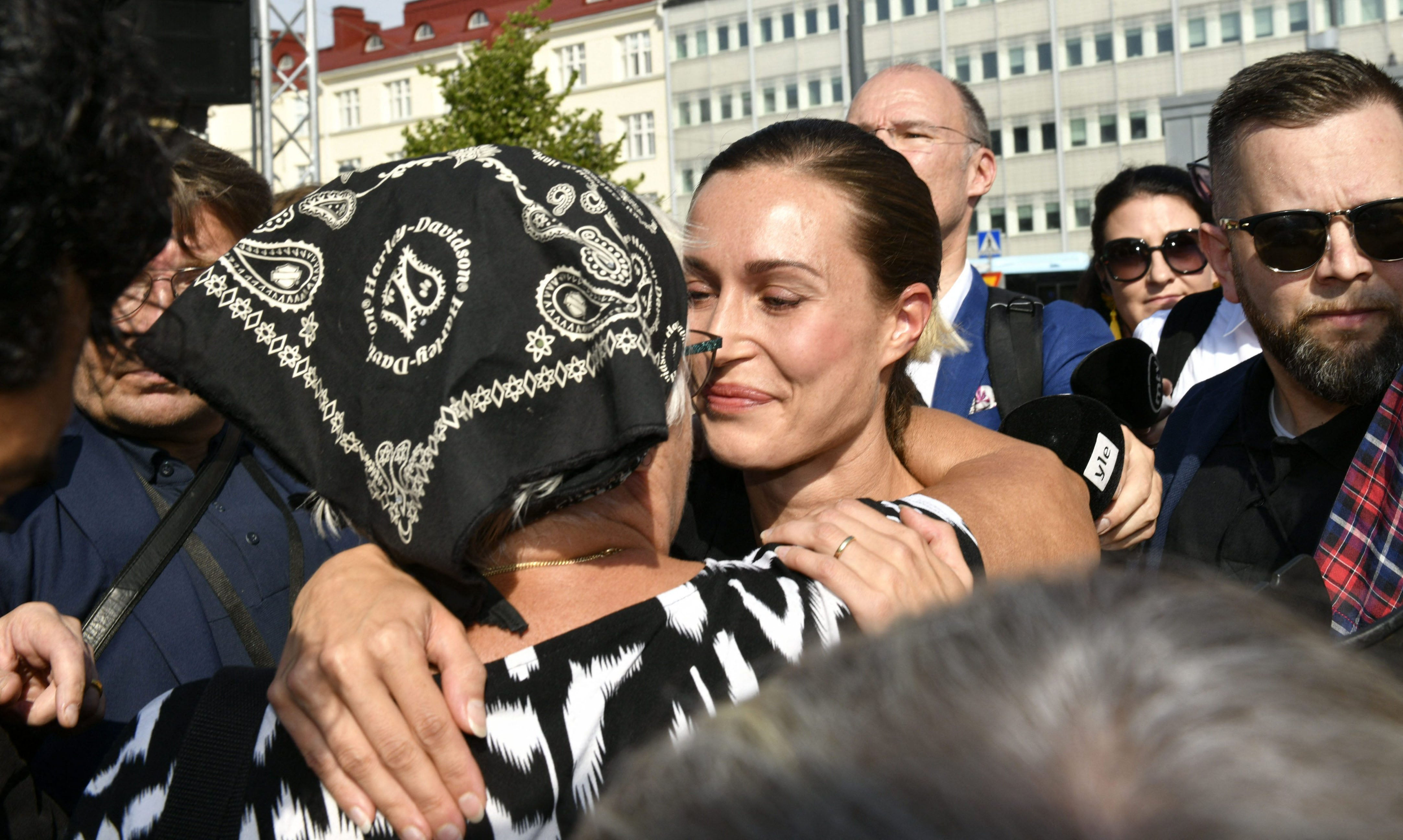 Marin is hugged by a supporter in Lahti on Wednesday