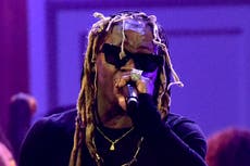 Lil Wayne threatens to end show after fan throws object on stage