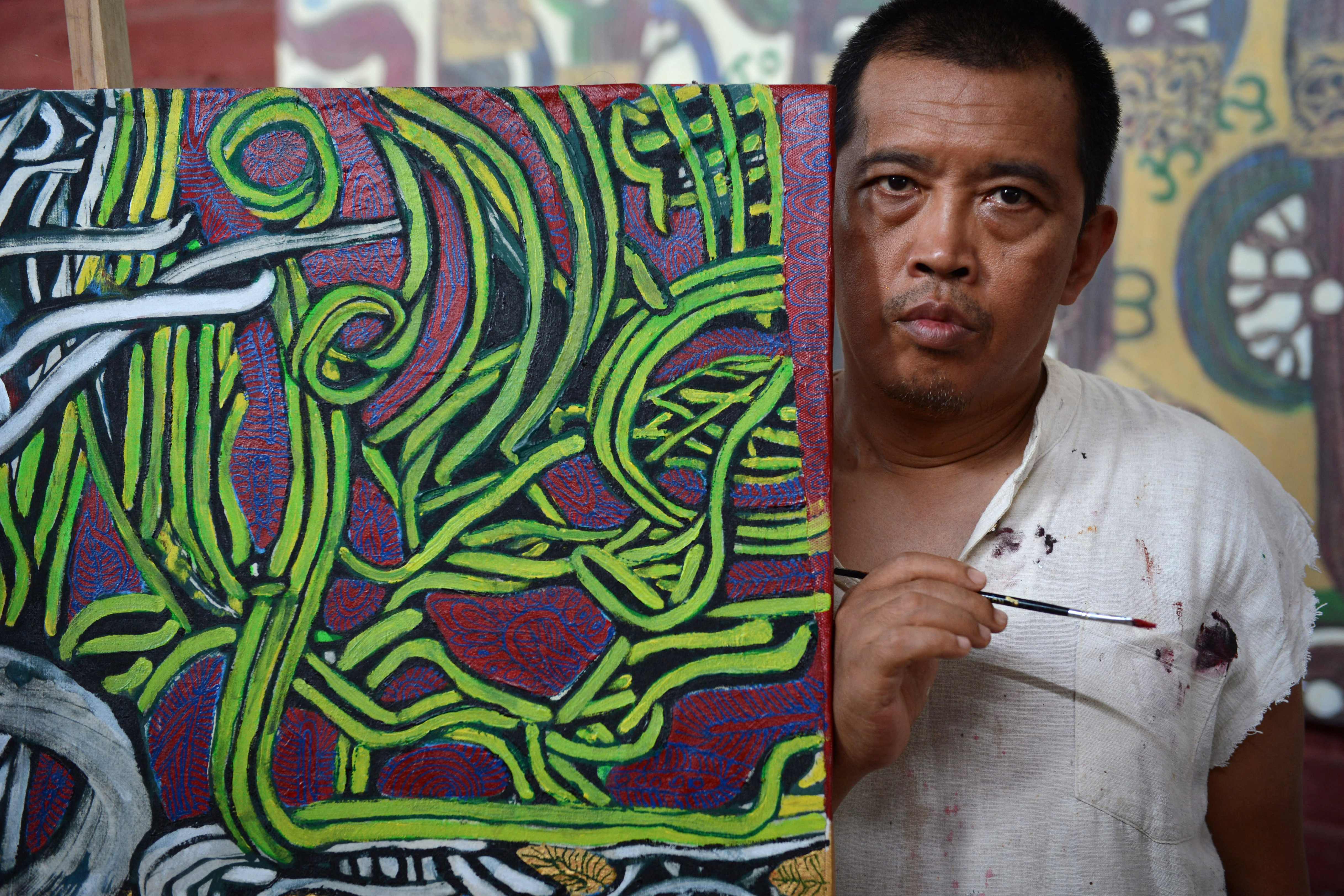 Bowman’s husband, Myanmar artist Htein Lin, in his studio in Yangon in 2015