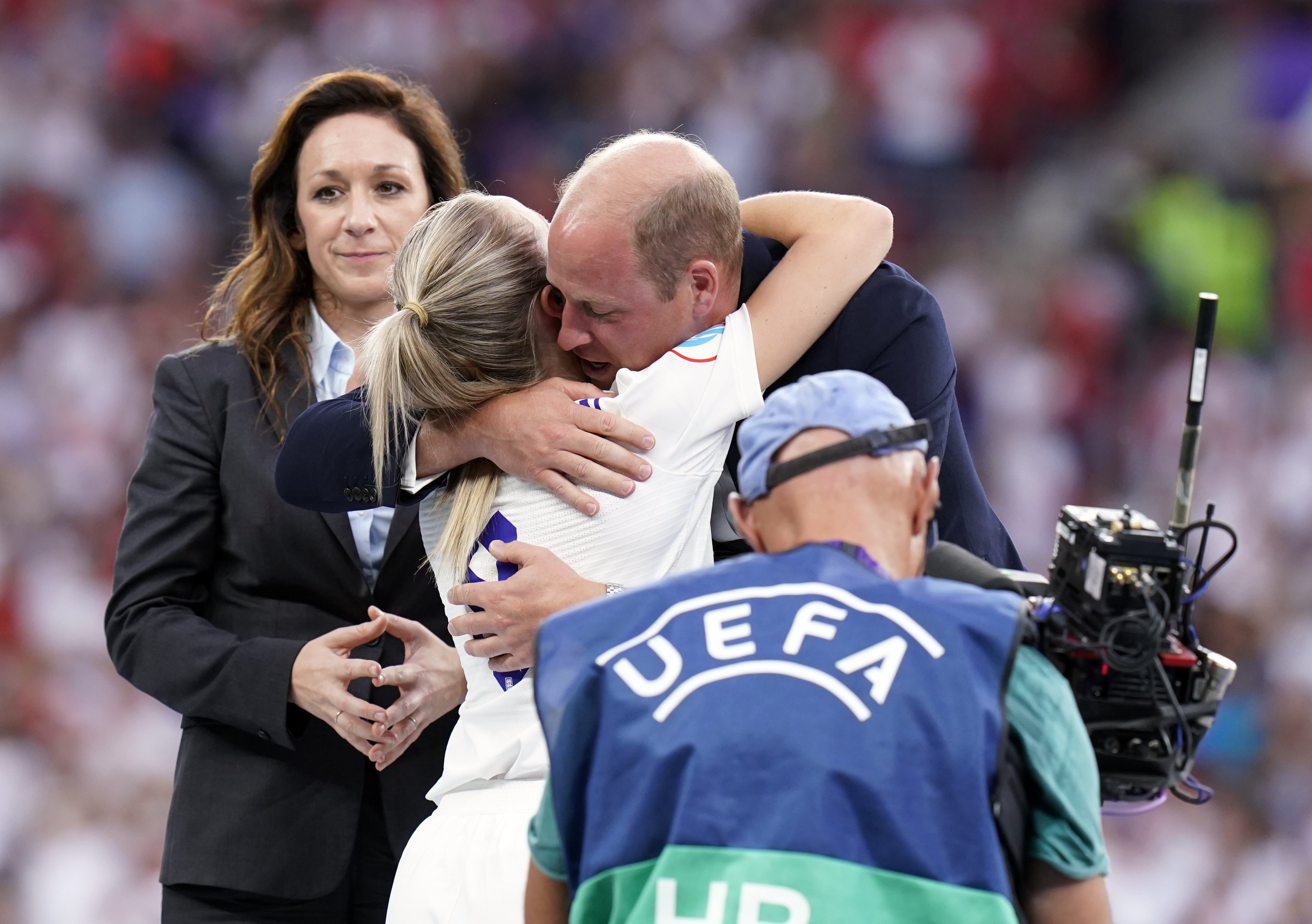 William hugs England’s football captain Leah Williamson after the national team’s victory over Germany at the Women’s Euro 2022 final (Danny Lawson/PA)