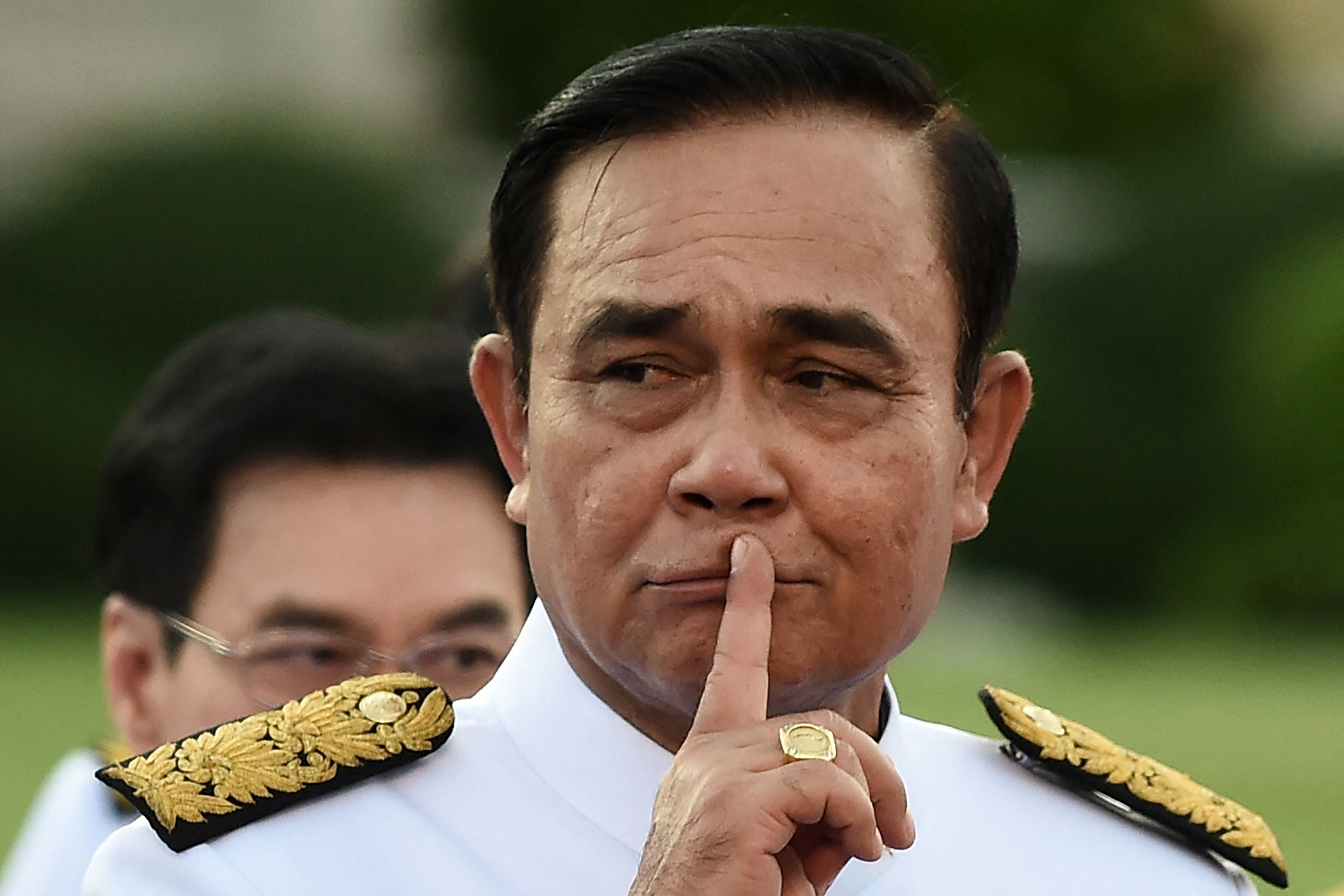 File Thailand's Prime Minister Prayut Chan-O-Cha gestures as he arrives for a photo opportunity with members of the new Thai cabinet at Government in 2019