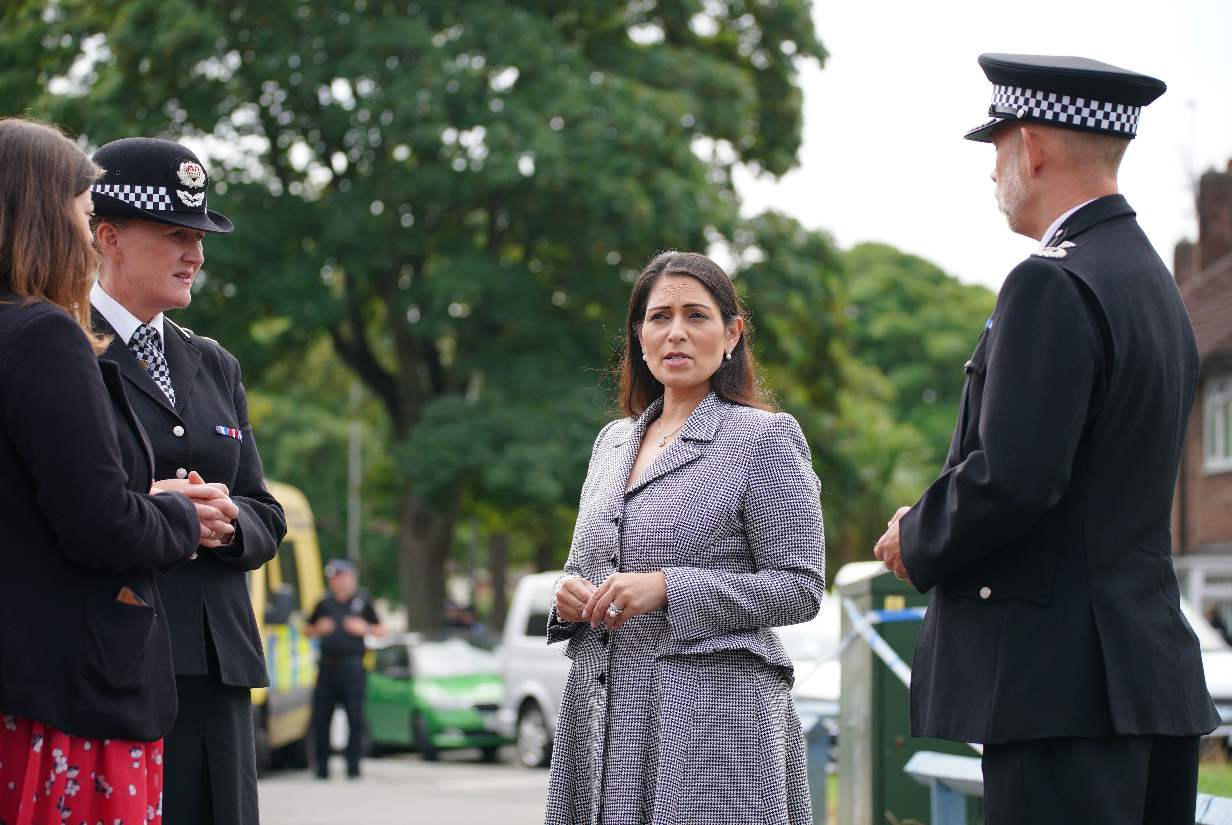 Home Secretary Priti Patel (centre right) visits the scene in Kingsheath Avenue, Knotty Ash, Liverpool, where nine-year-old Olivia Pratt-Korbel was fatally shot on Monday night (Peter Byrne/PA)