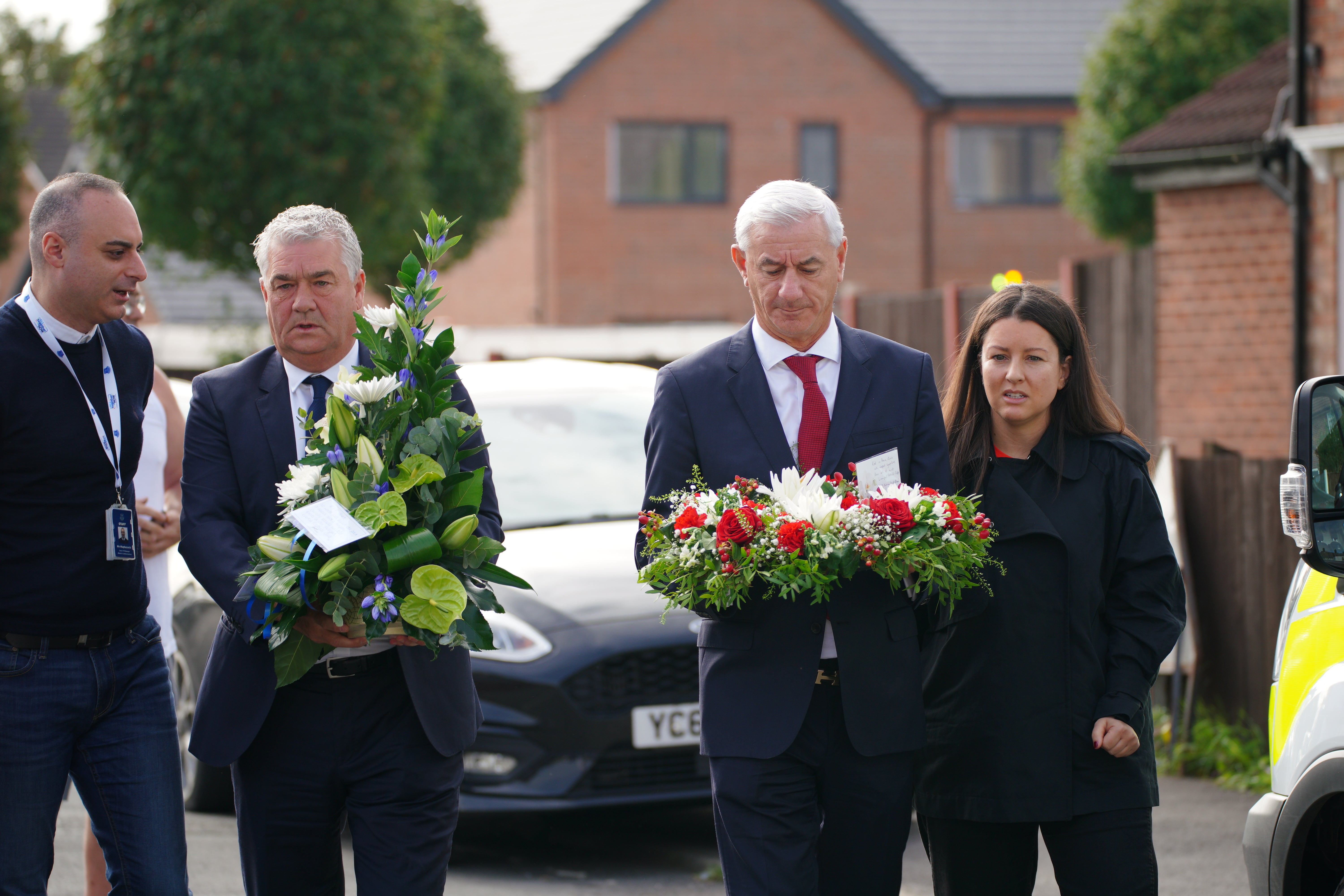 The ambassador of Liverpool FC, Ian Rush (right), and the ambassador of Everton FC, Ian Snodin, visit the scene