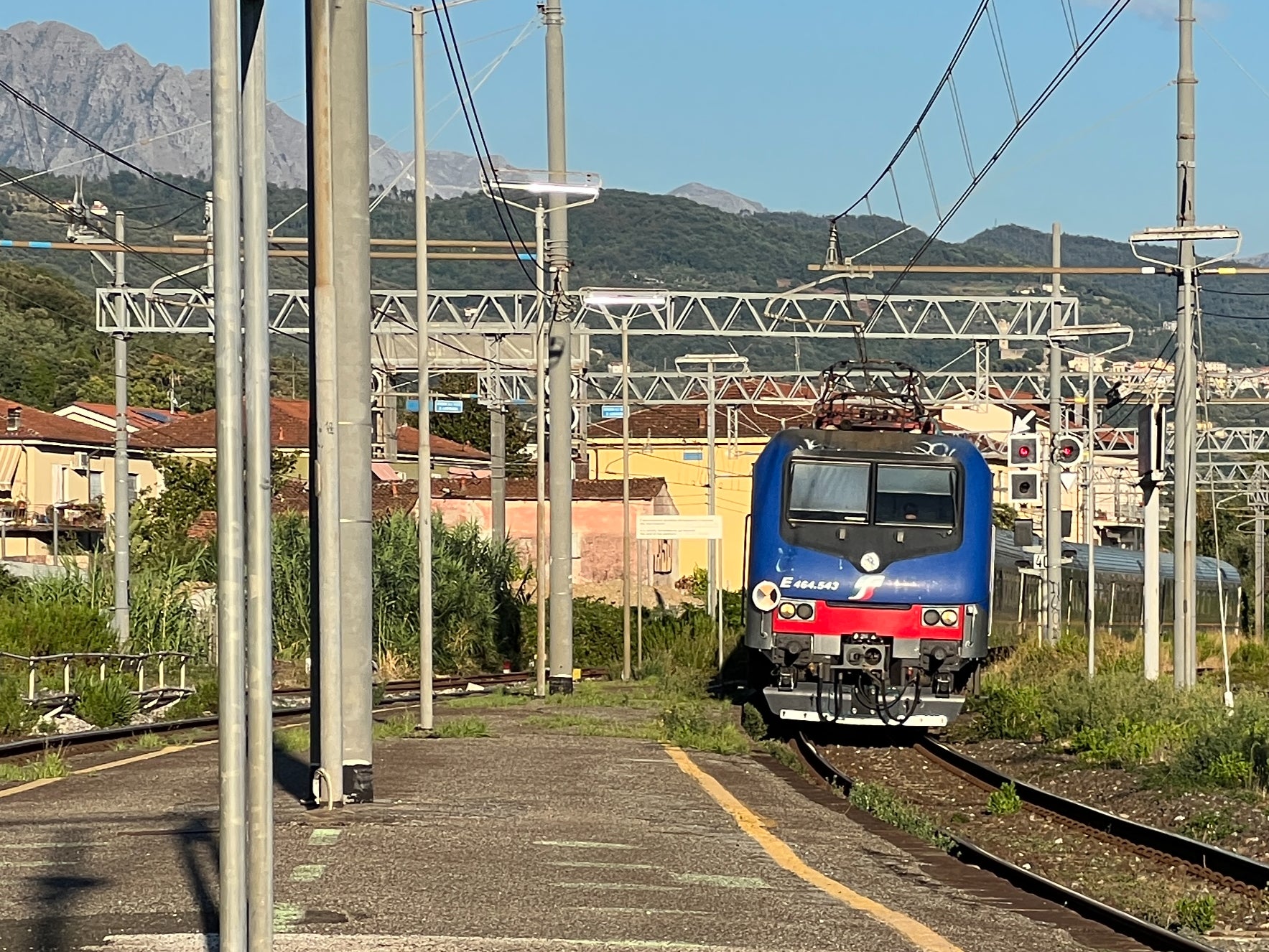 Destination unknown: Italian passenger train approaching Sarzana, close to the Ligurian coast