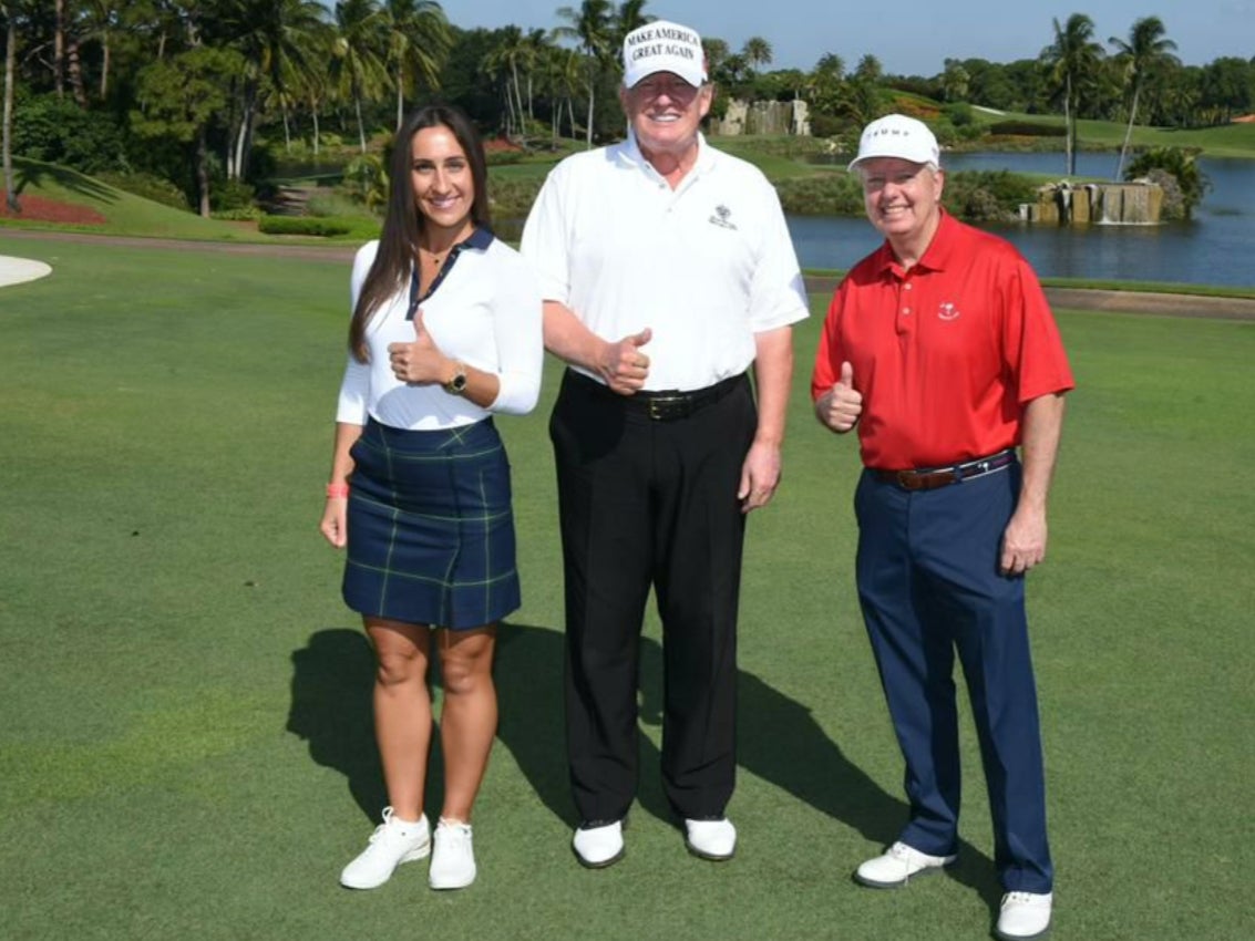 A woman going by the name ‘Anna de Rothschild’ — allegedly an alias used by Ukrainian-born Inna Yashchyshyn — posing with former President Donald Trump and Senator Lindsey Graham at Mar-a-Lago.