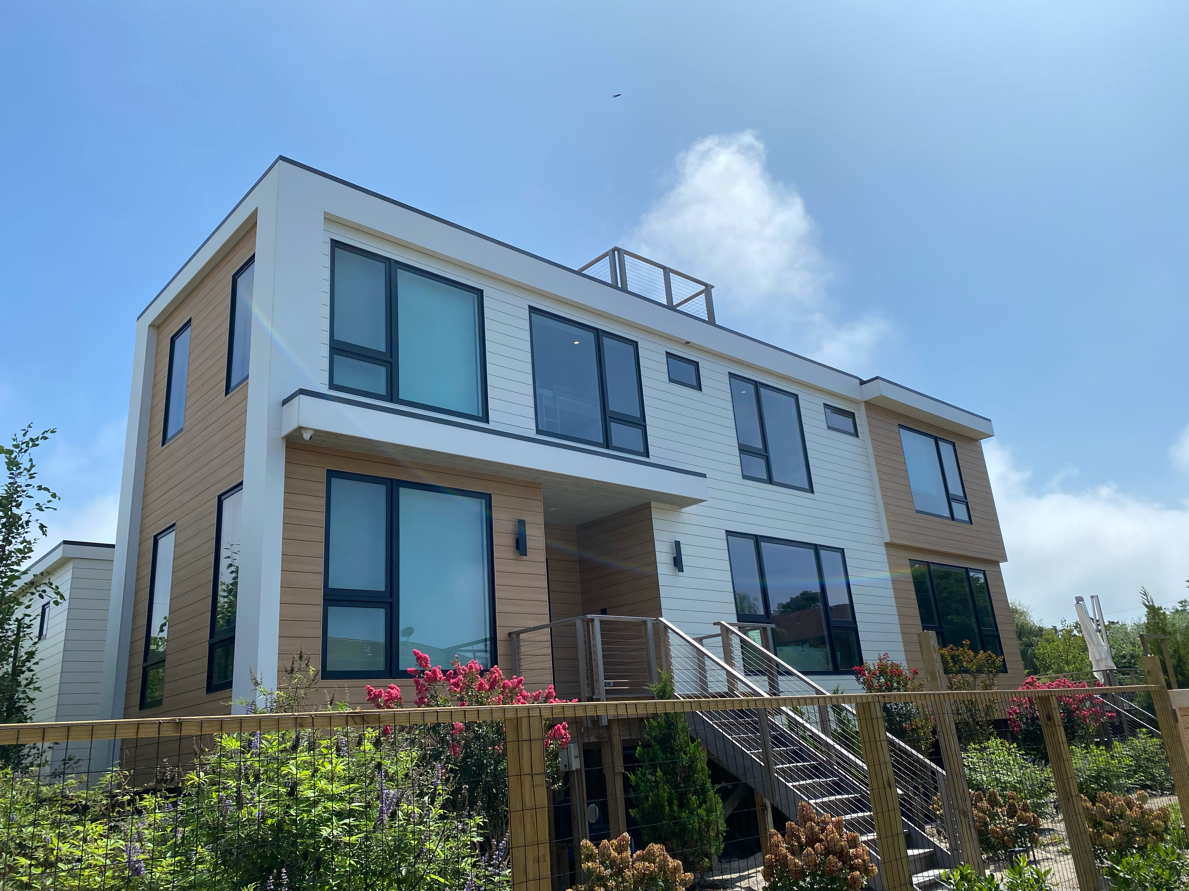 Historic cottages are bing torn down to make way for gleaming new mansions like this one at Ocean Beach, Fire Island